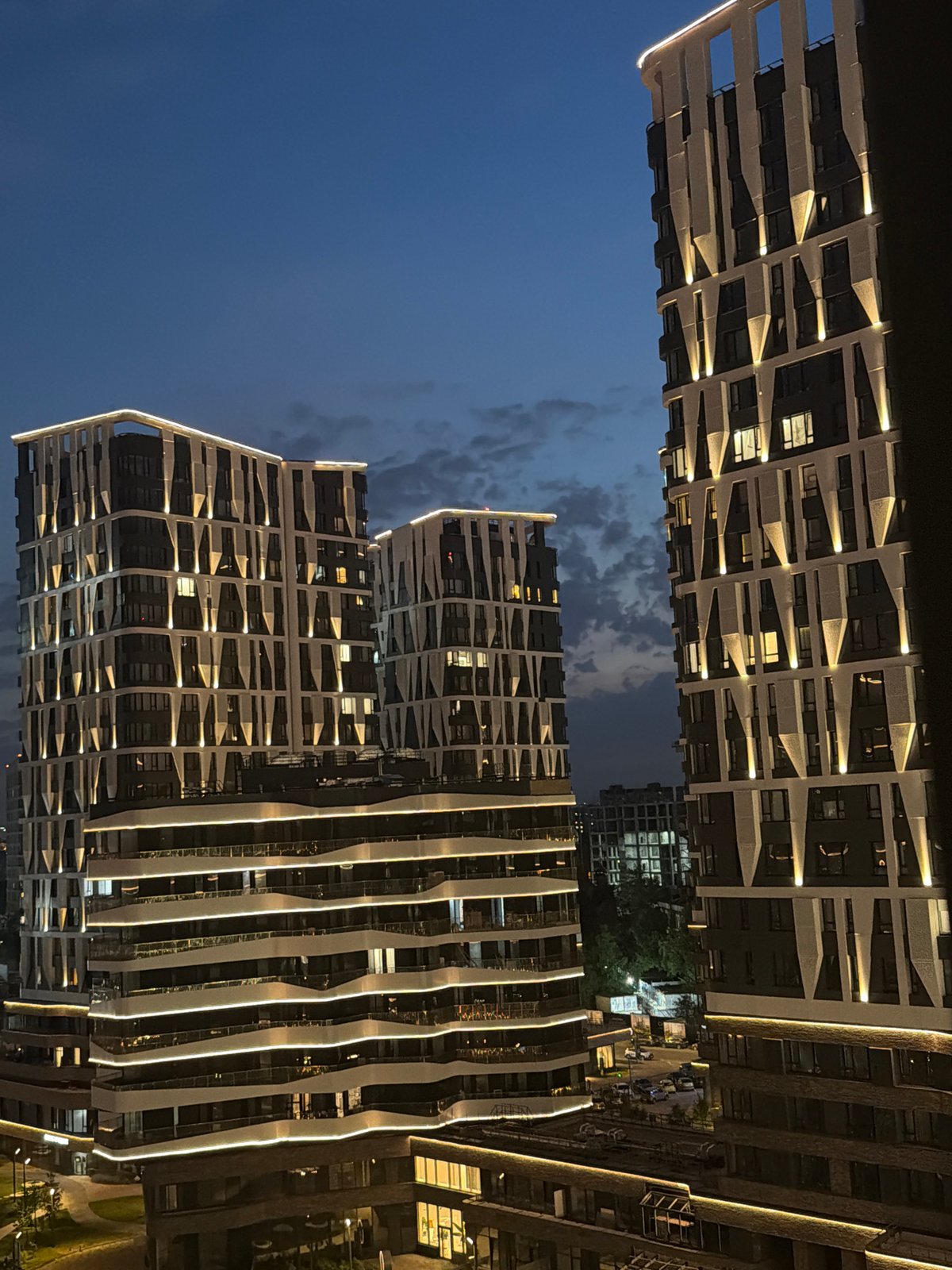 Moscow residential complex illuminated during evening twilight hours