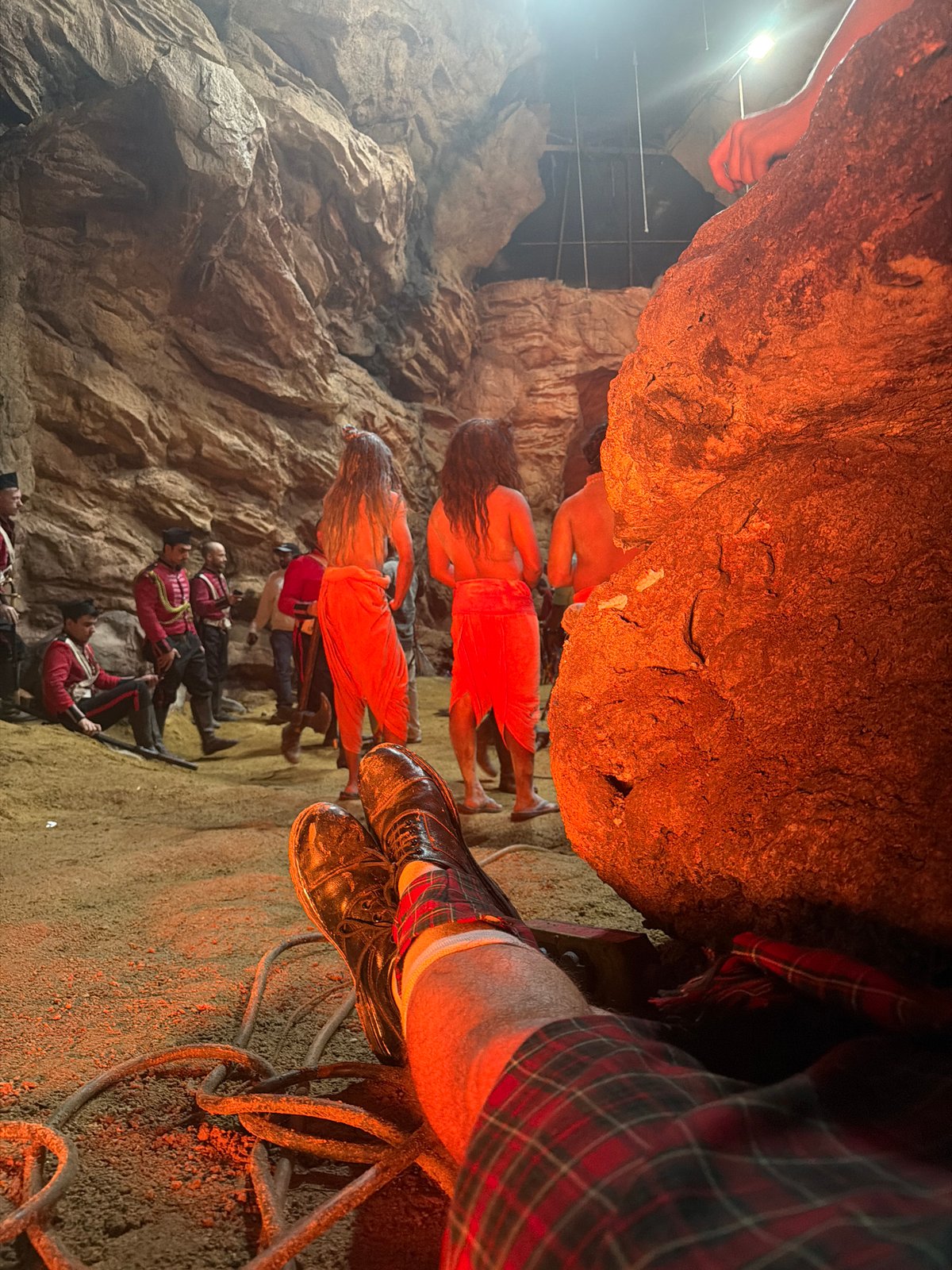 Inside a cave-like set in Hyderabad, ground-level perspective