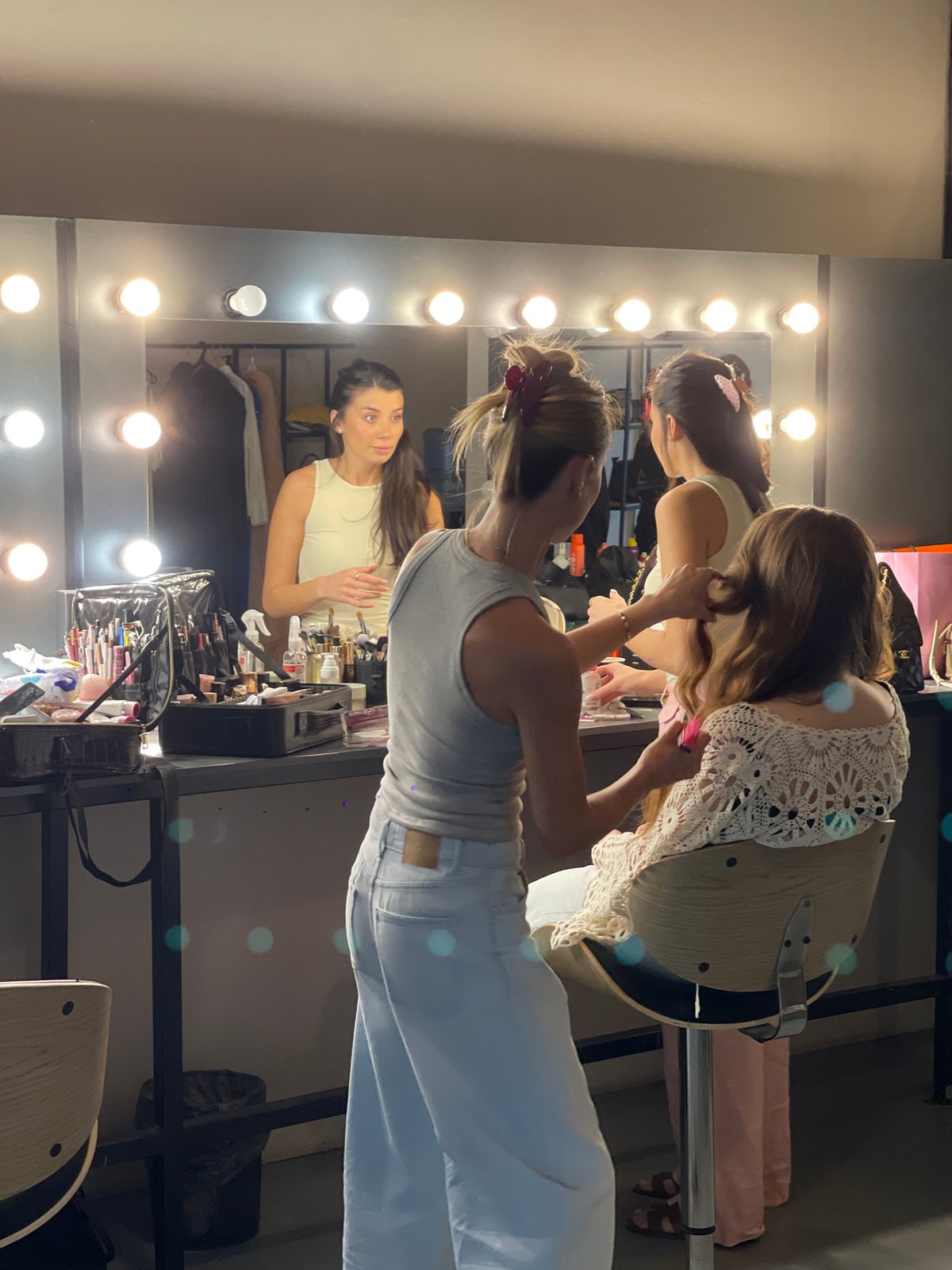 Women prepare backstage with professional lighting in Kyiv studio
