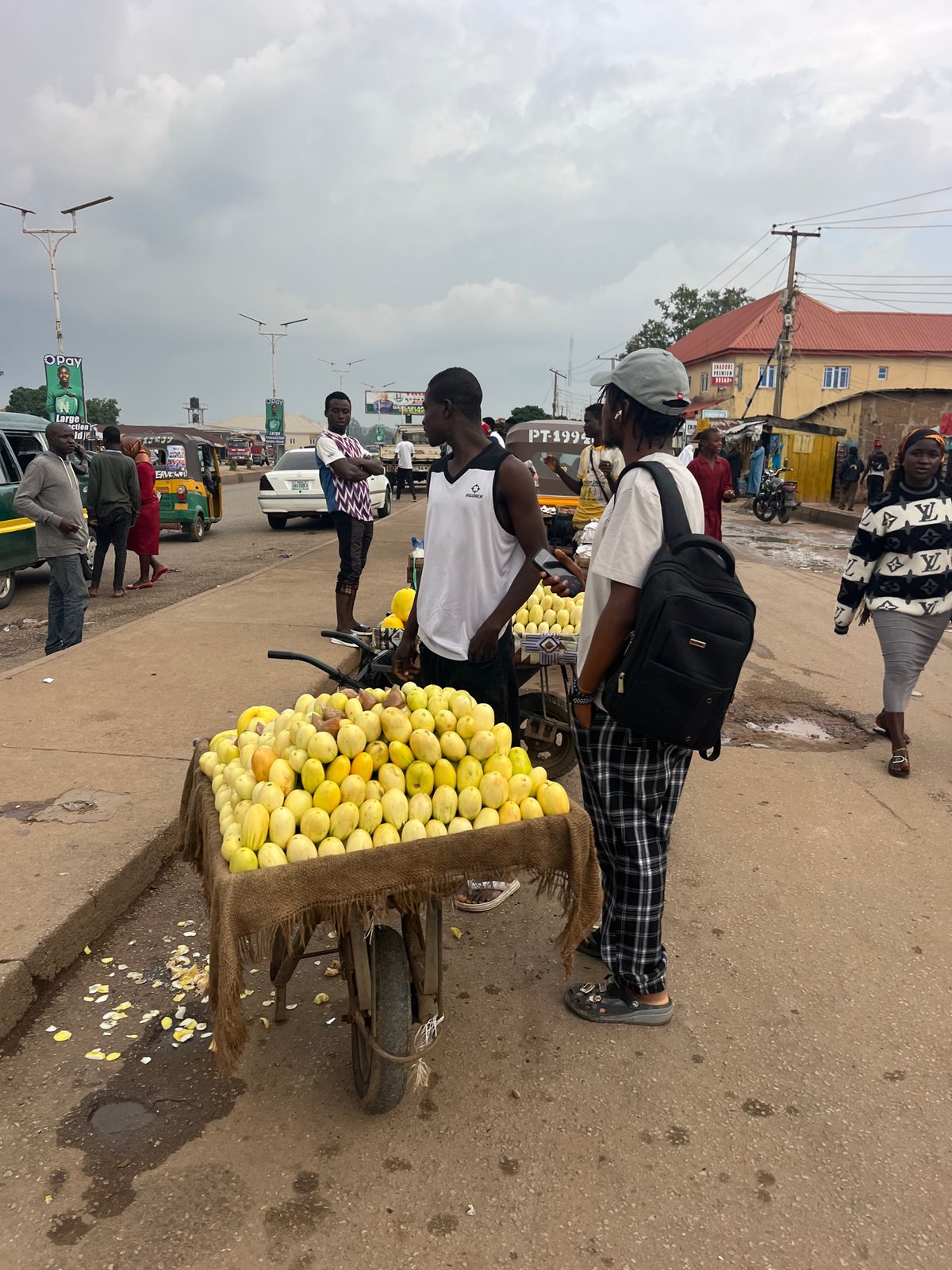 Street life and market bustle in a busy tropical urban area