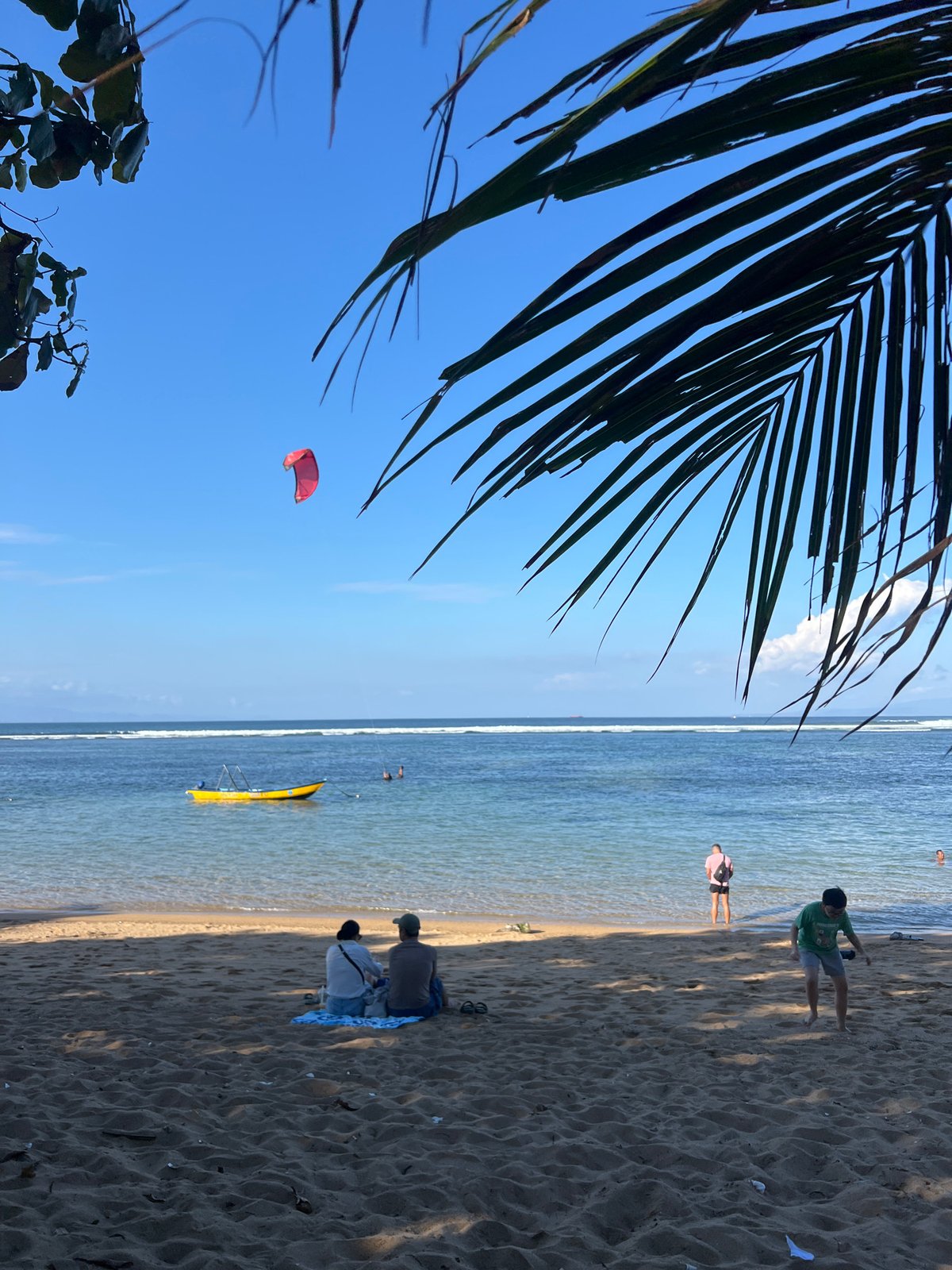 Morning beach activities documented across Denpasar, Indonesia