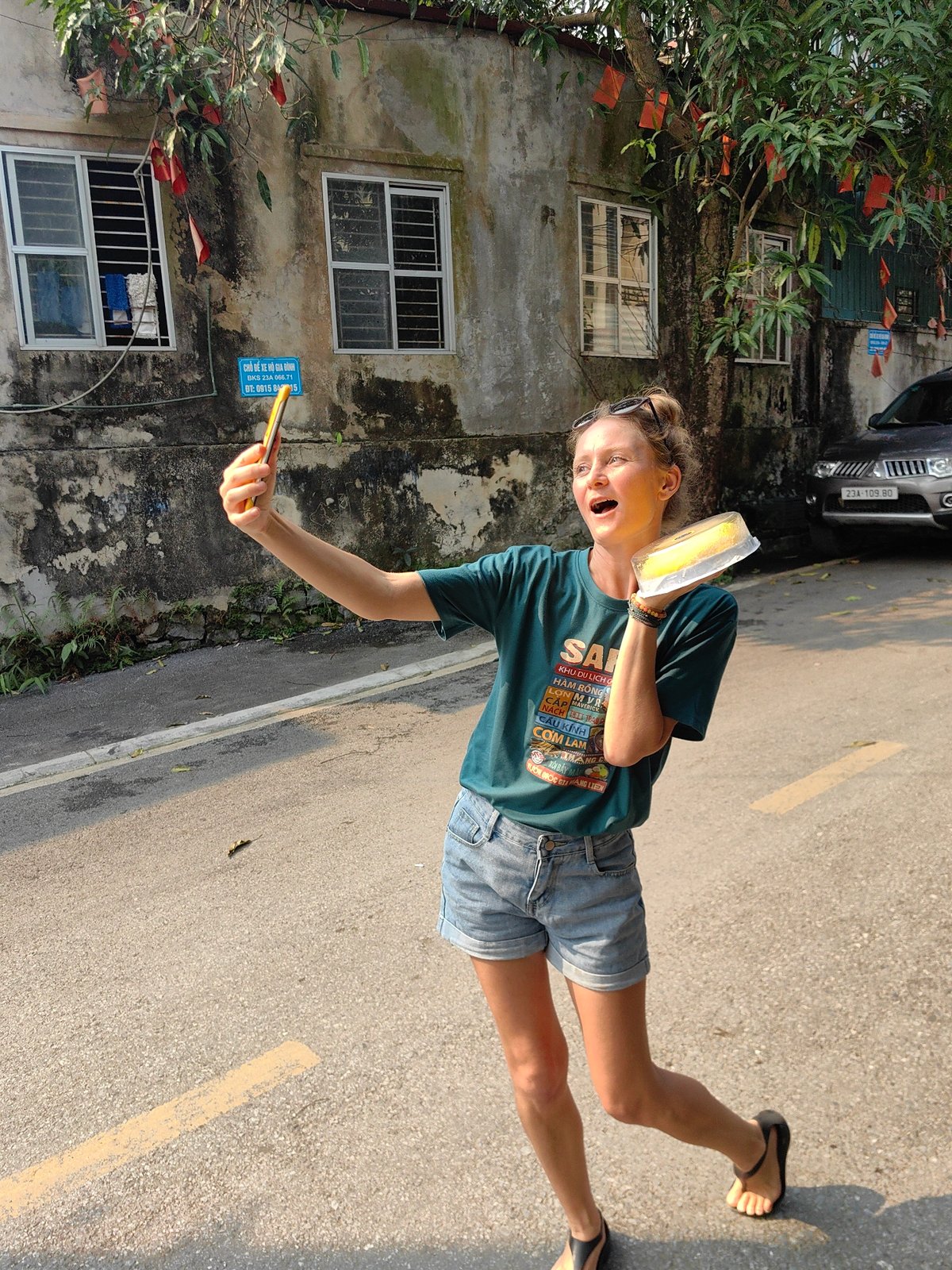 Tourist takes selfies with local cake in Hà Giang
