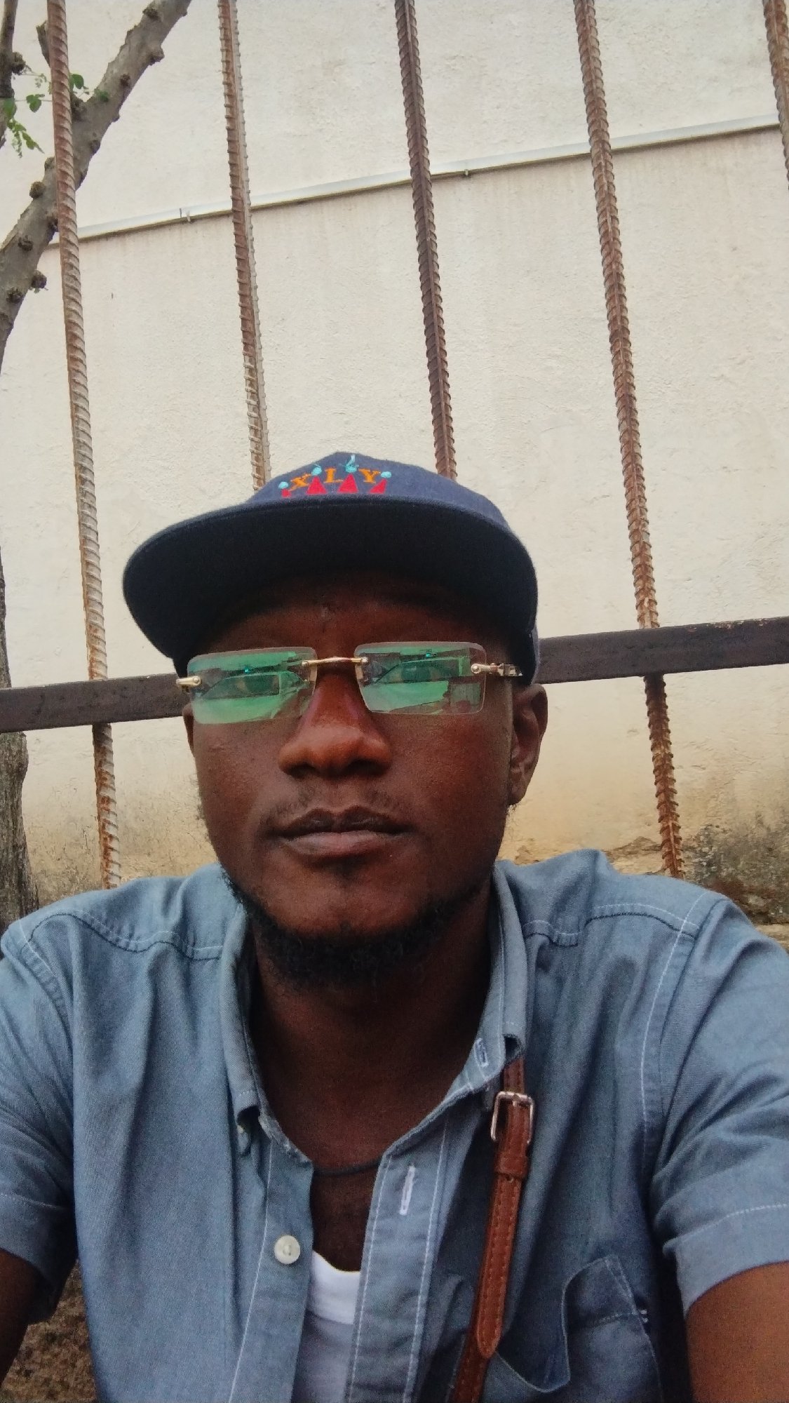 Overcast afternoon street life across central Jos, Nigeria