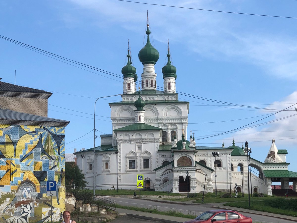 Historic churches and riverside wildlife on a summer afternoon in Solikamsk