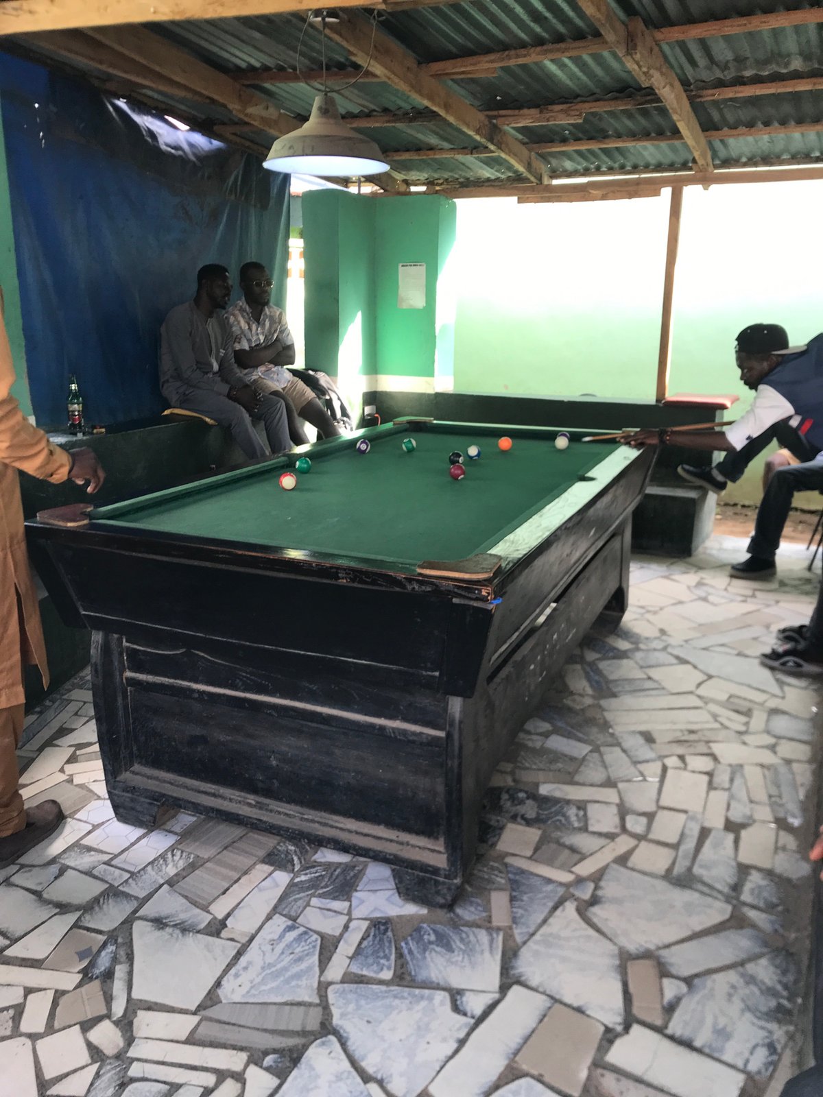 Casual afternoon moments documented around New Stadium, Nigeria
