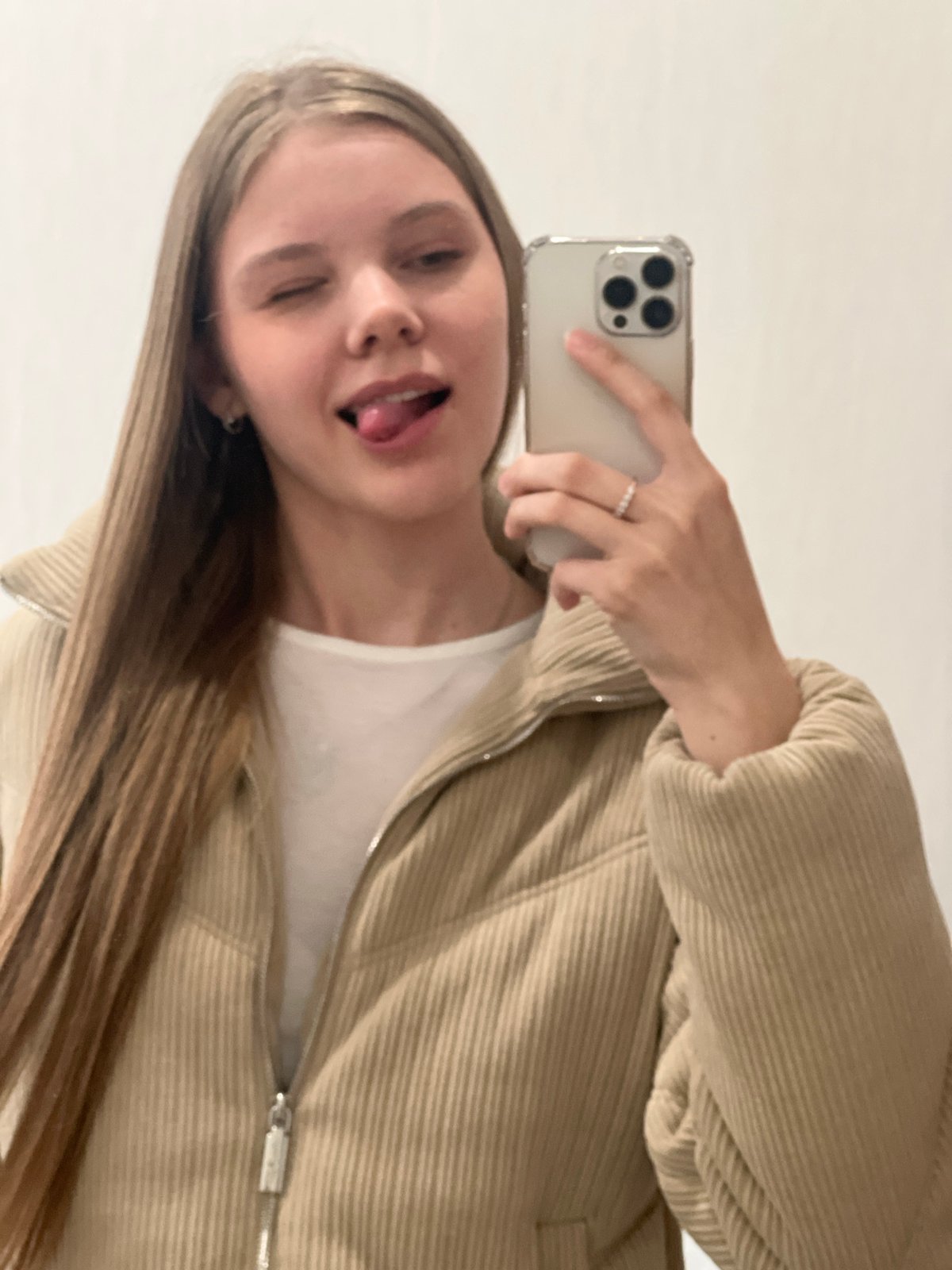 Woman takes selfies with sleeping Scottish Fold cat in Votkinsk