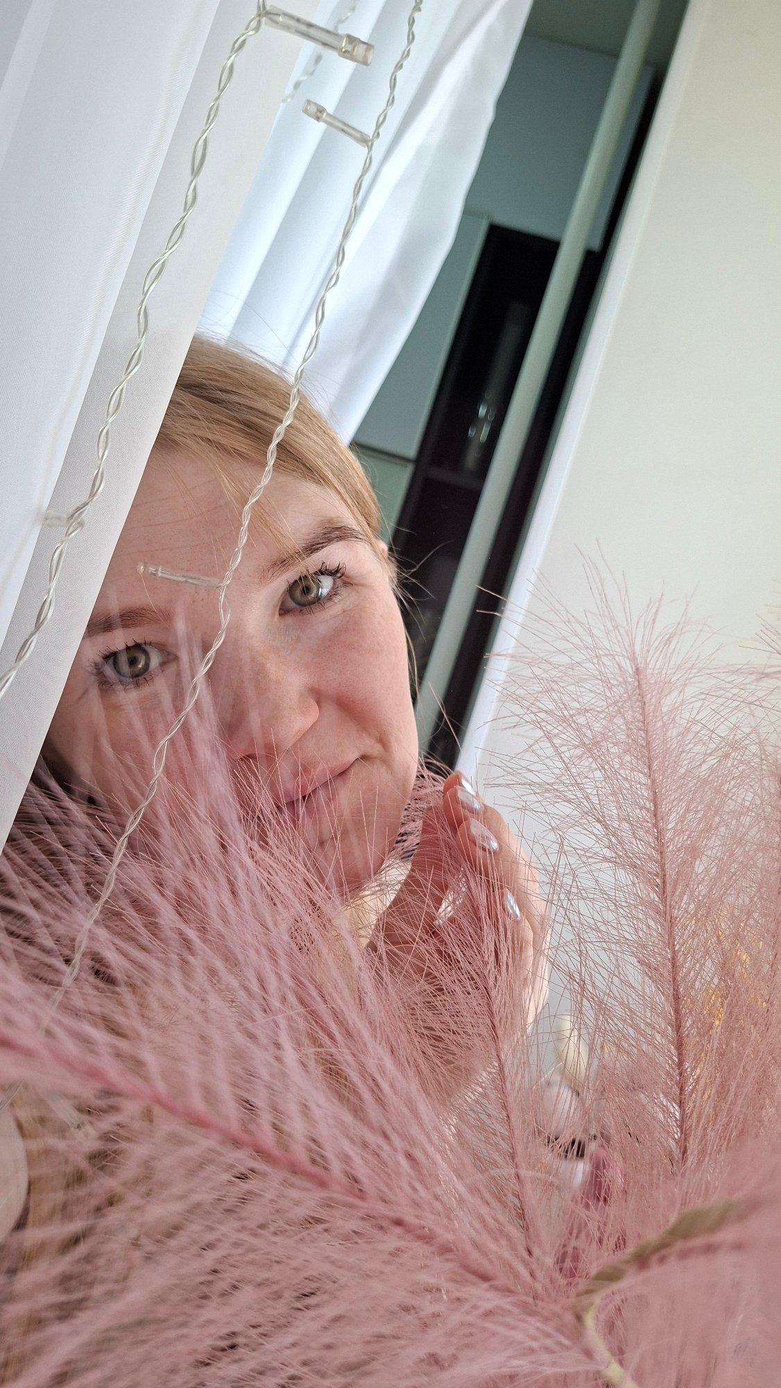 Woman takes early morning selfies with LED lights in Chaikovsky