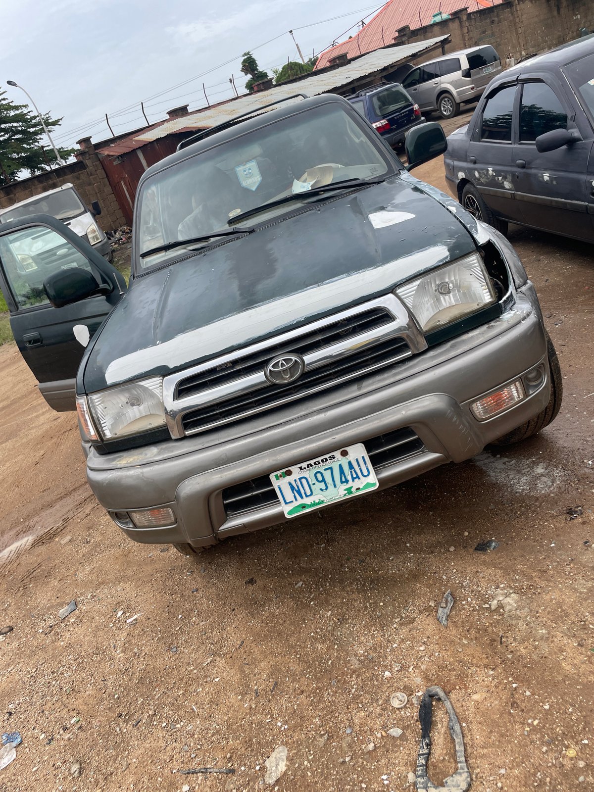 Automotive repair workshop activities documented in New Stadium, Nigeria