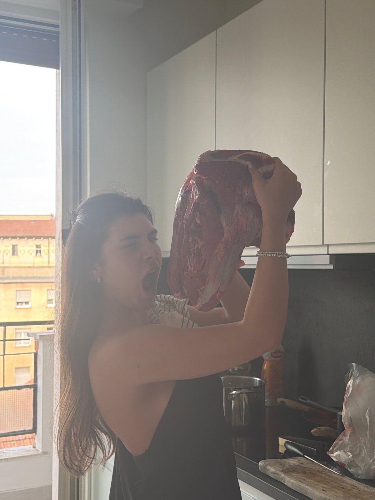 Cooking preparations and terrace dining captured in Milan