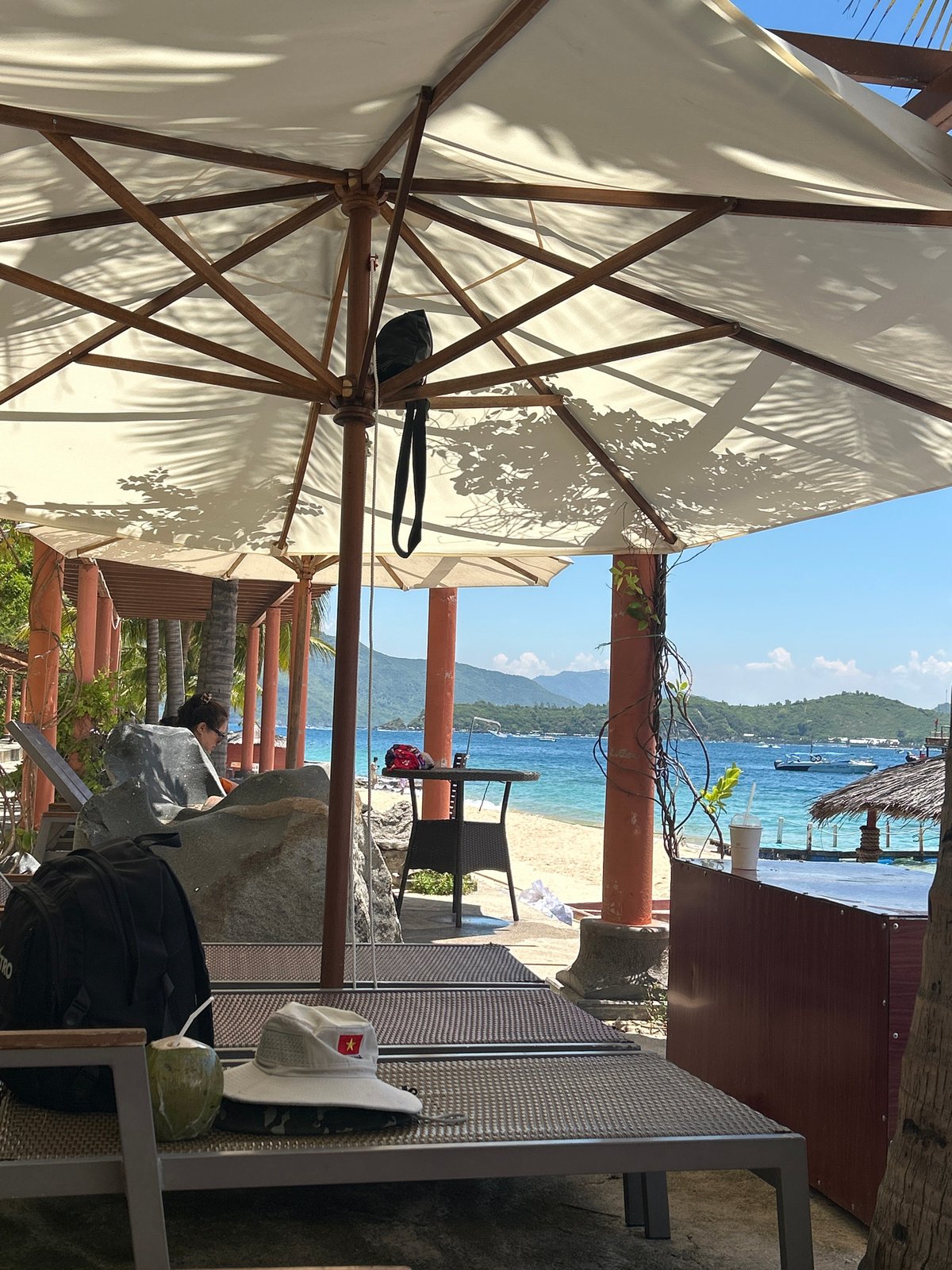 Lazy beach day in Nha Trang with coconuts and shade