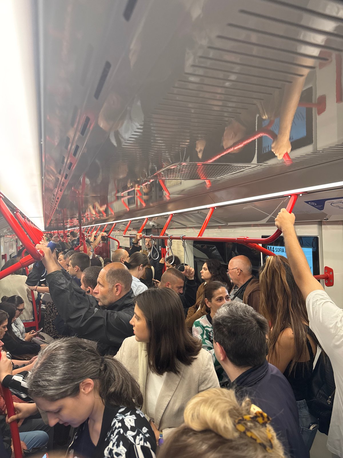 Morning rush hour crowds pack Sofia metro train