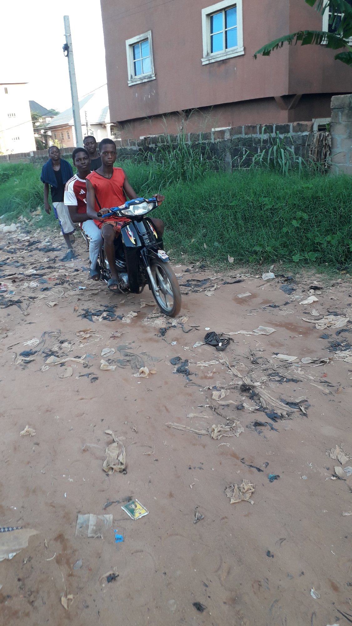 Daily life scenes documented across Nkpor, Nigeria neighborhood