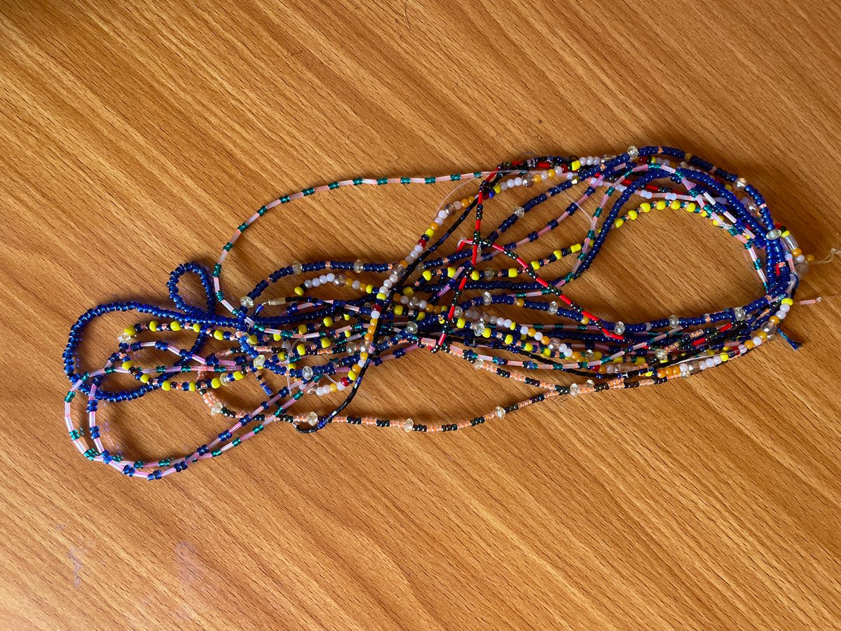 Beaded jewelry and school courtyard life in Television, Nigeria