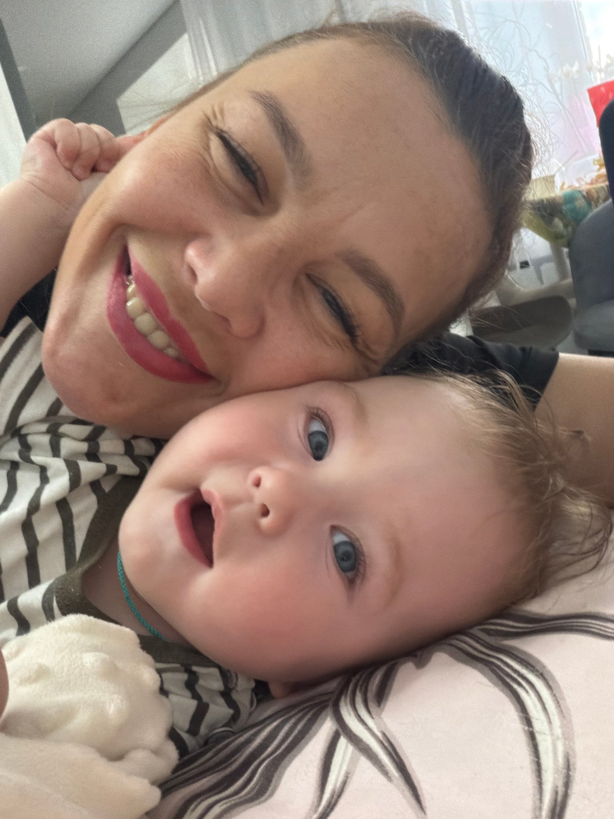 Lazy afternoon selfies with a baby at home in Chaikovsky