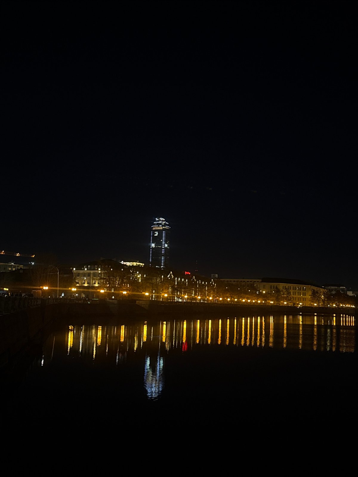 Nighttime cityscape photography session captures illuminated Yekaterinburg skyline