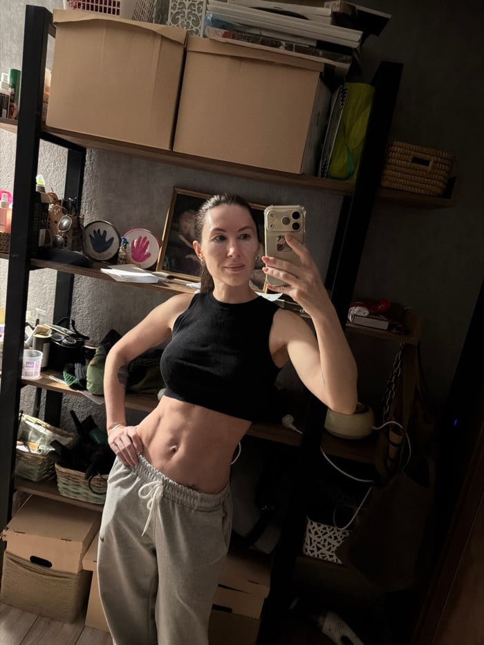 Woman's morning routine documented in Perm apartment