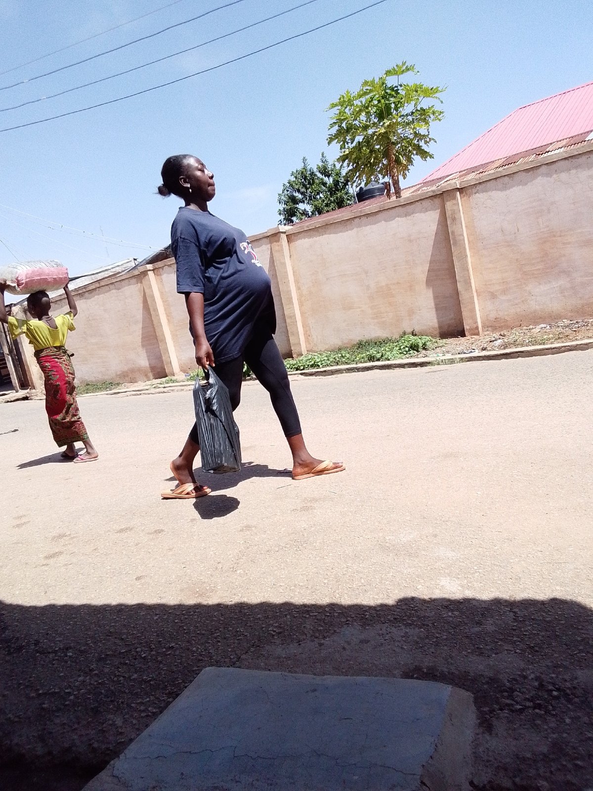 Morning street life documented across Jos, Nigeria neighborhoods