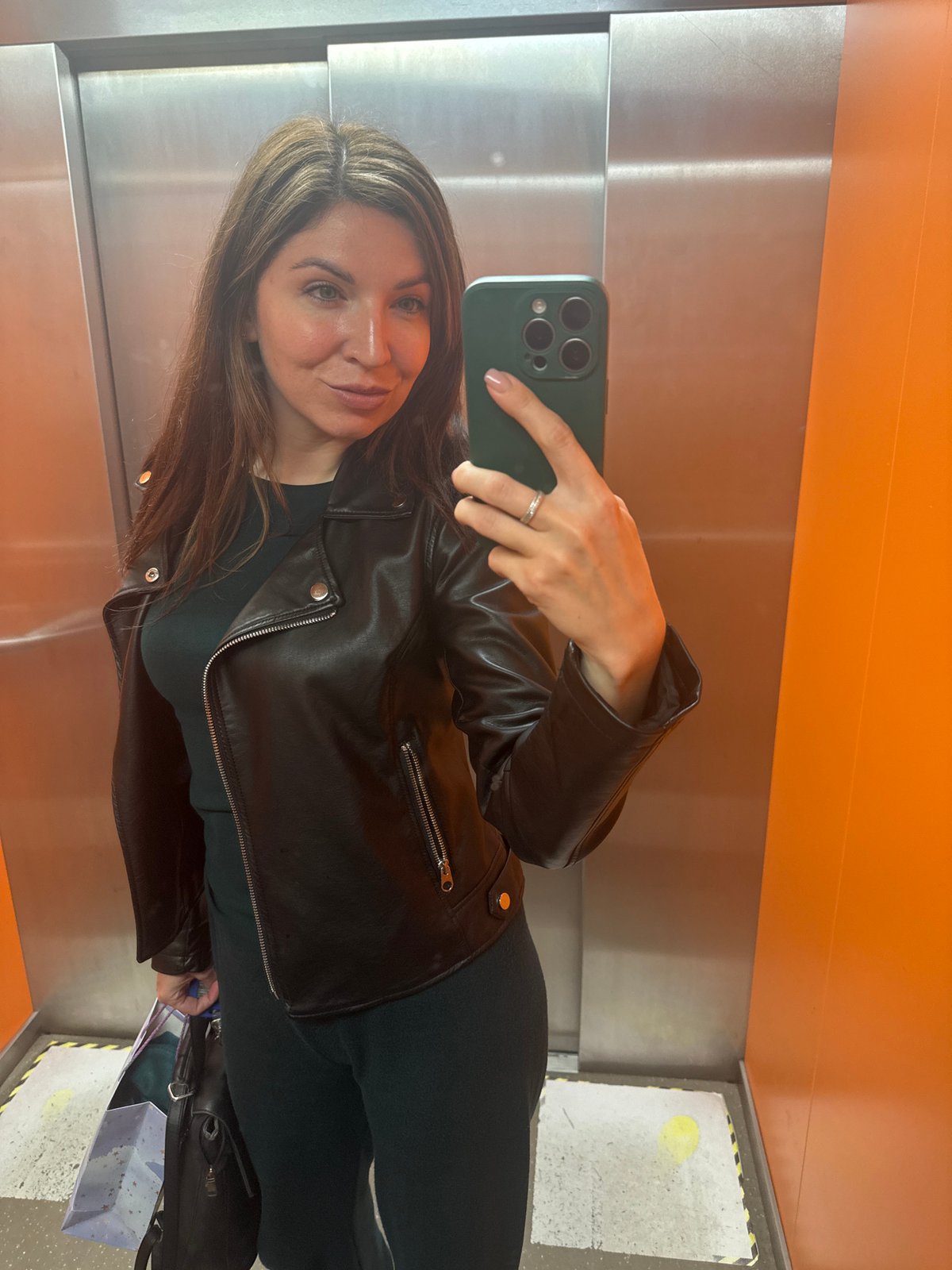 Woman takes elevator selfie in Kryvyi Rih, Ukraine