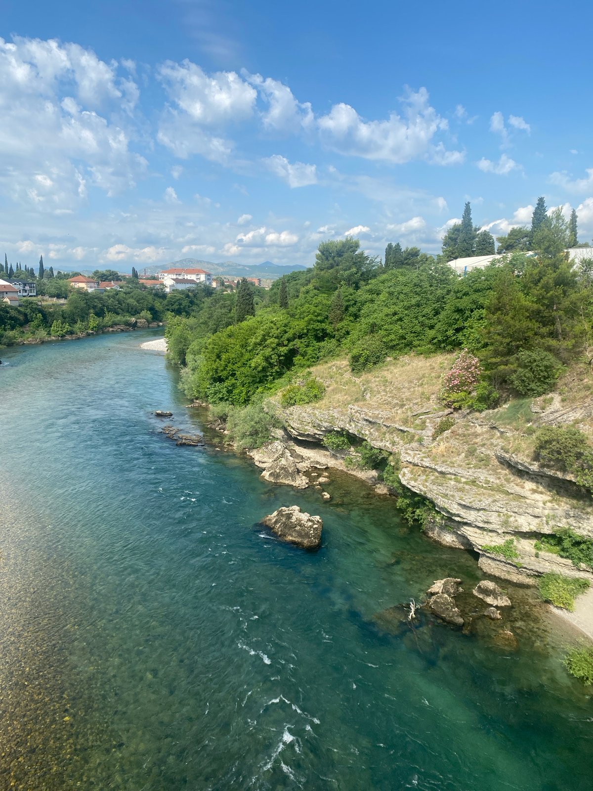 Clear turquoise river captured in aerial view near Podgorica