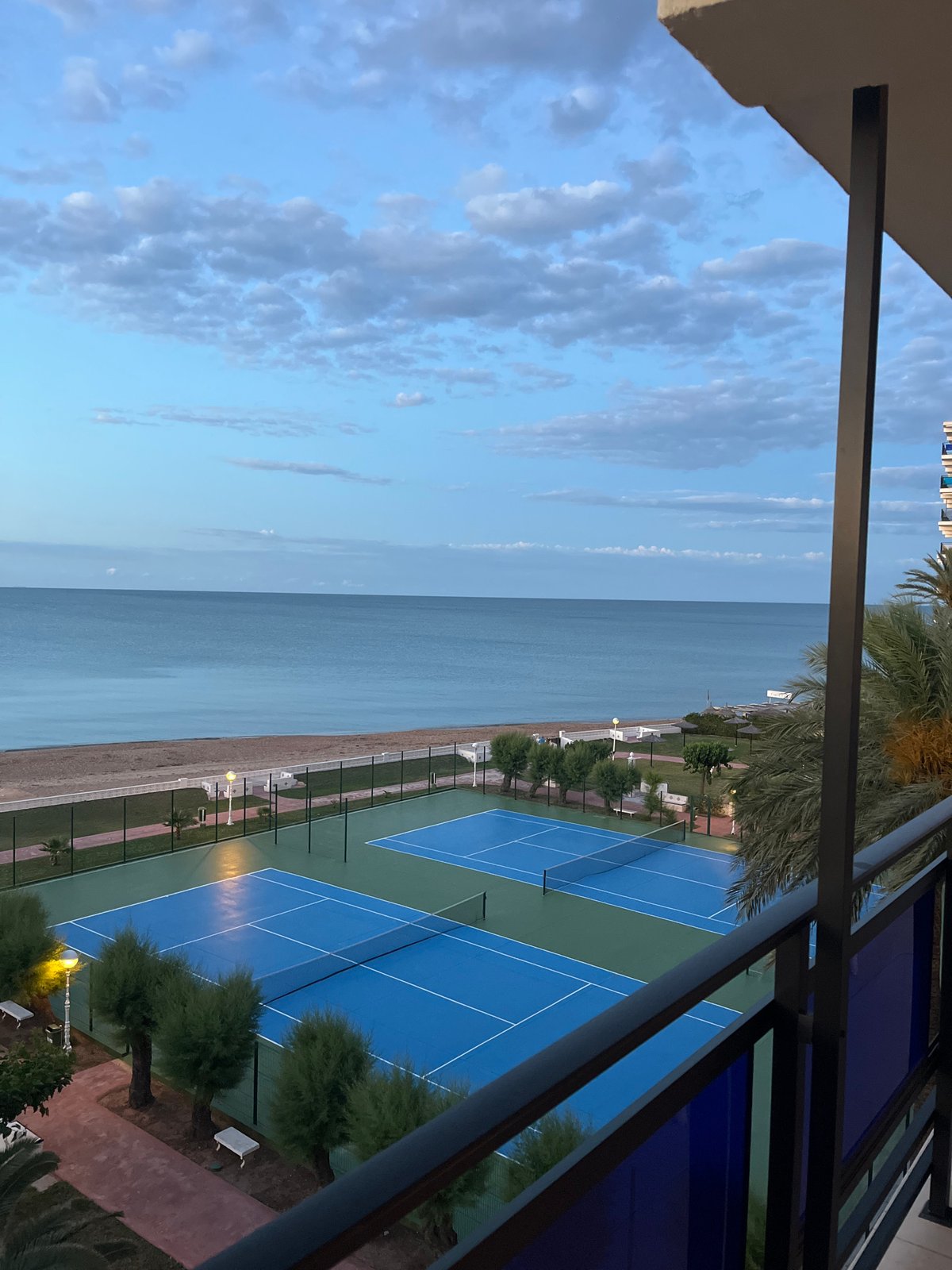 Coastal sunset views captured from balcony in Les Marines