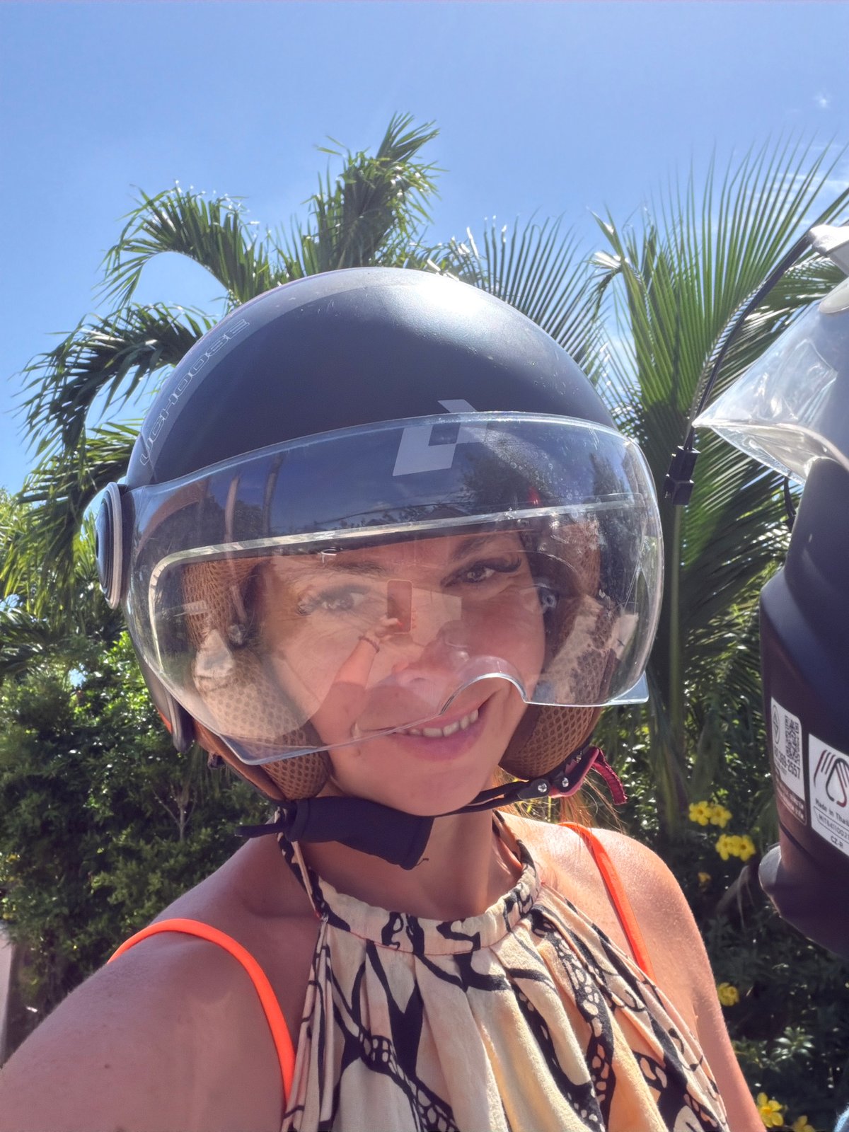 Scooters and bungalows on a sunny Ko Samui morning