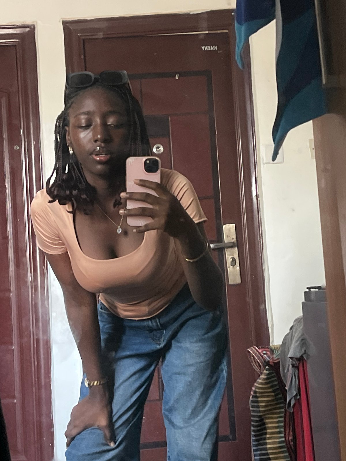 Woman conducts indoor photo session in Abuja, Nigeria