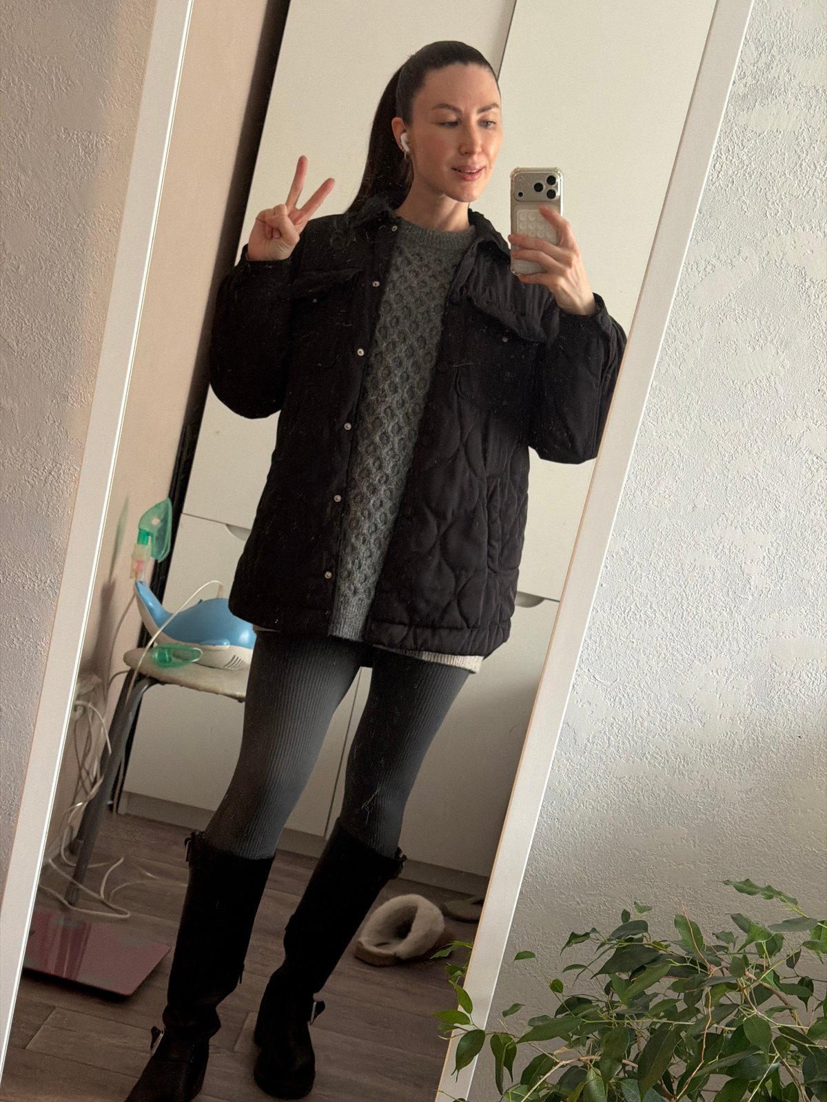 Woman takes mirror selfies at Perm residence