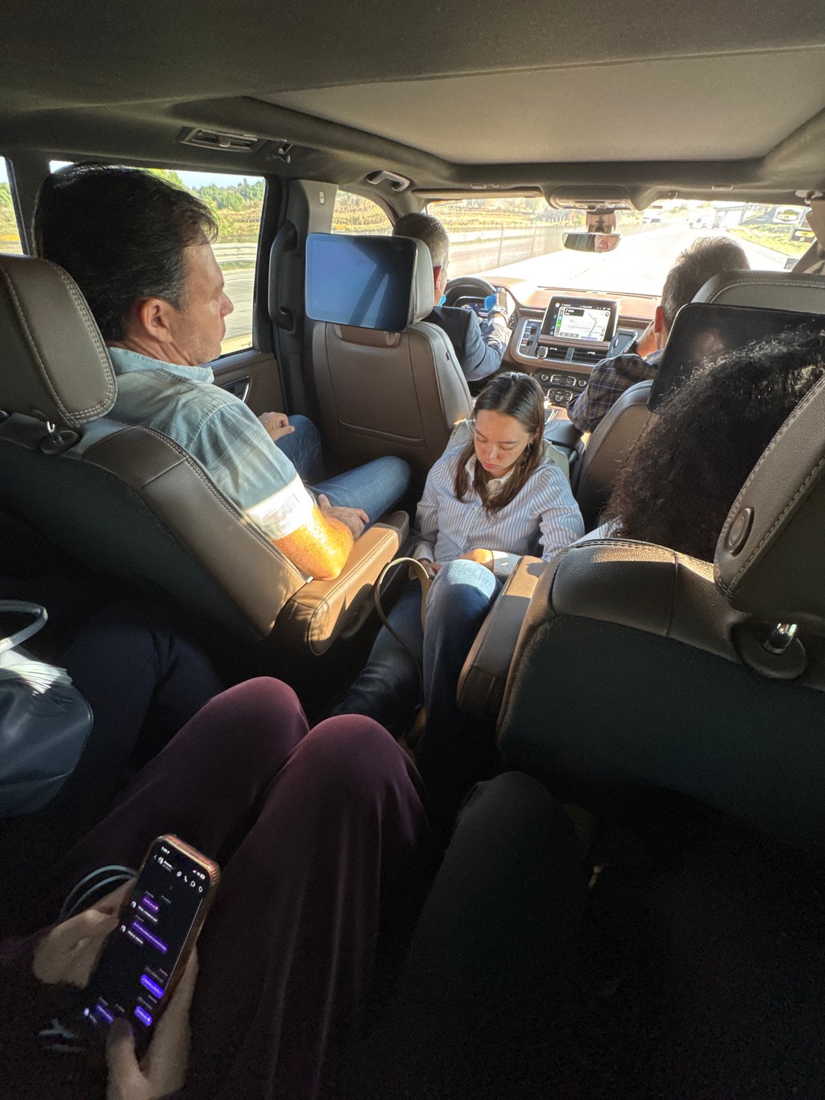 Passengers travel in vehicle with monitors near Mexico City