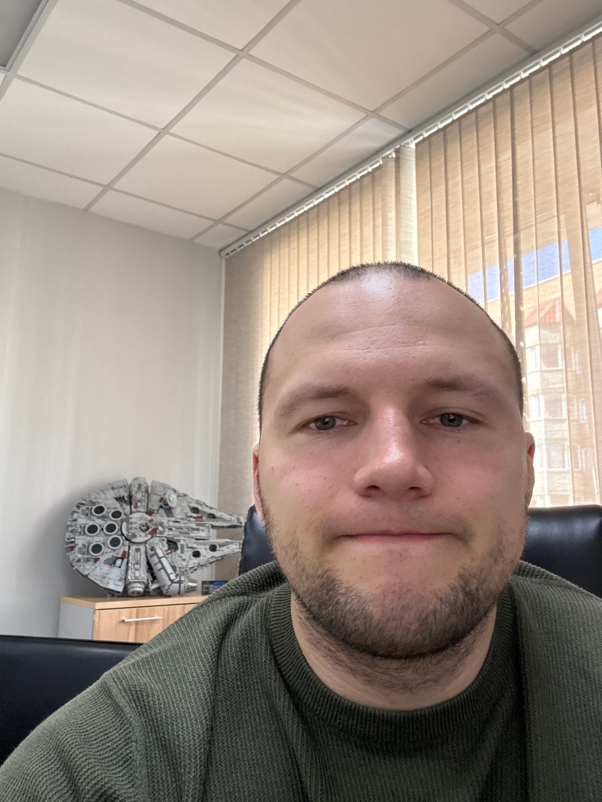 Krasnoyarsk resident documents selfies, Lego Millennium Falcon model