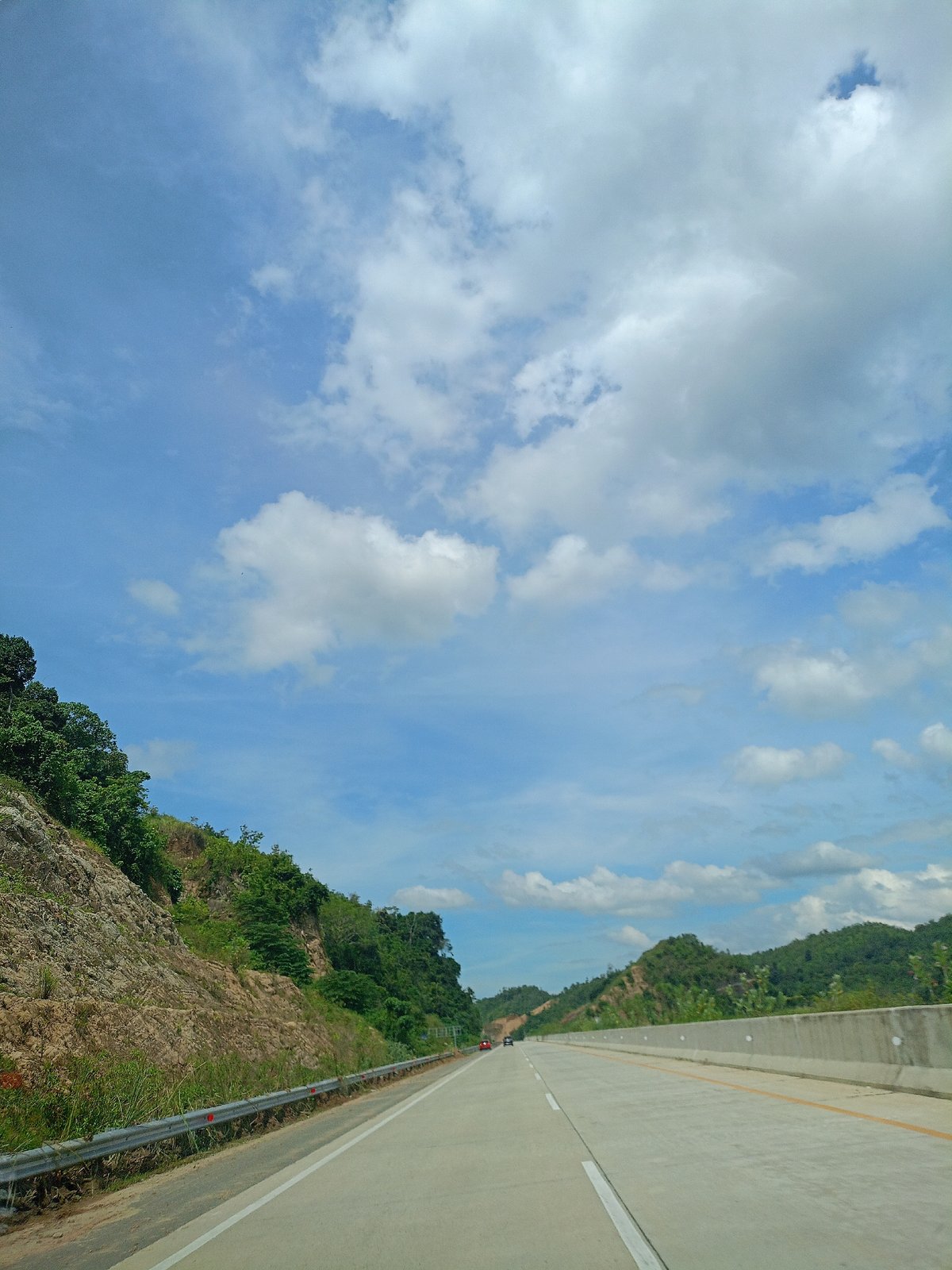 Morning highway travel captured near Suyo Paloh, Indonesia