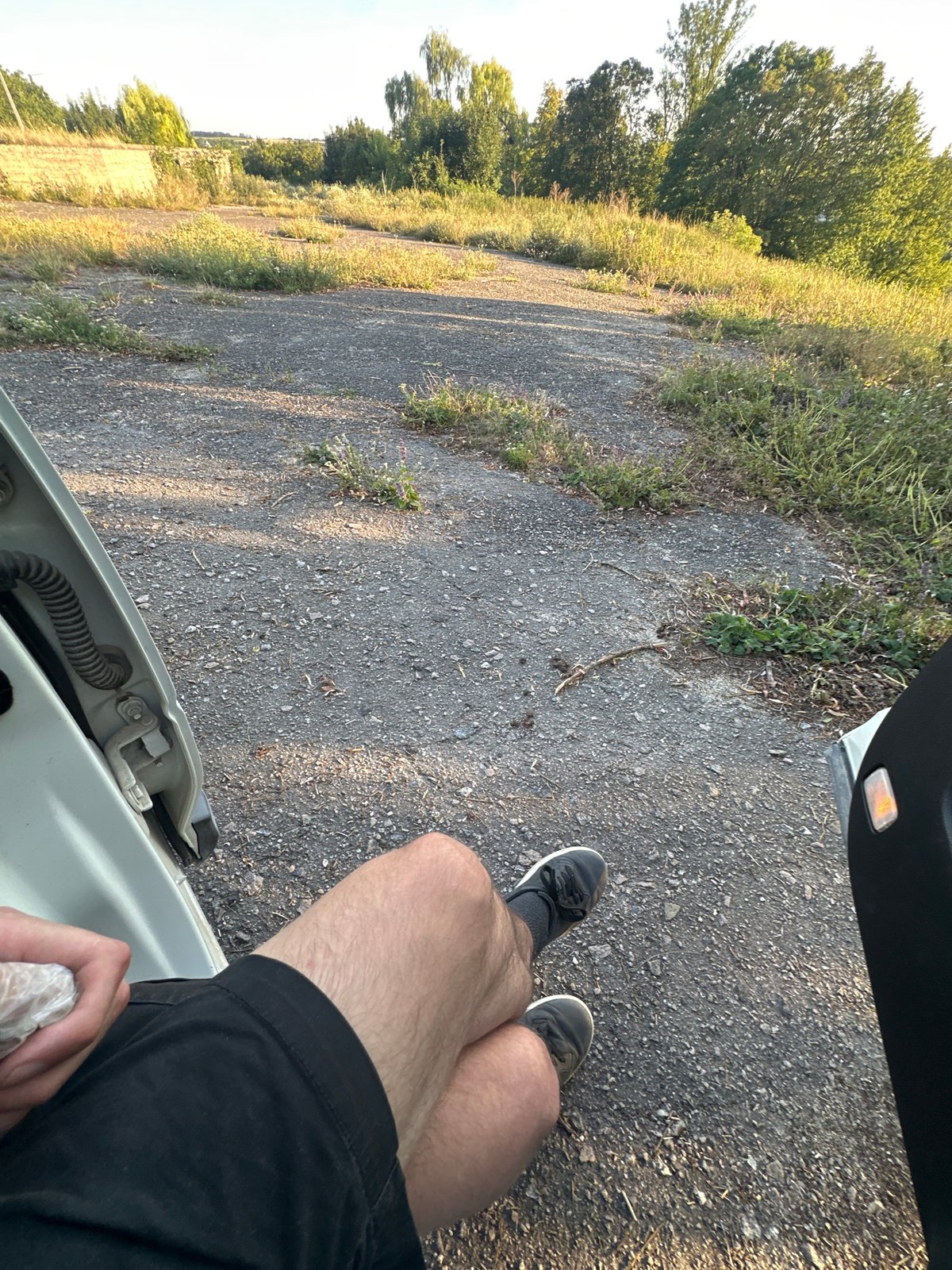 Parked off a rural path in Makiv, Ukraine, mid-afternoon.