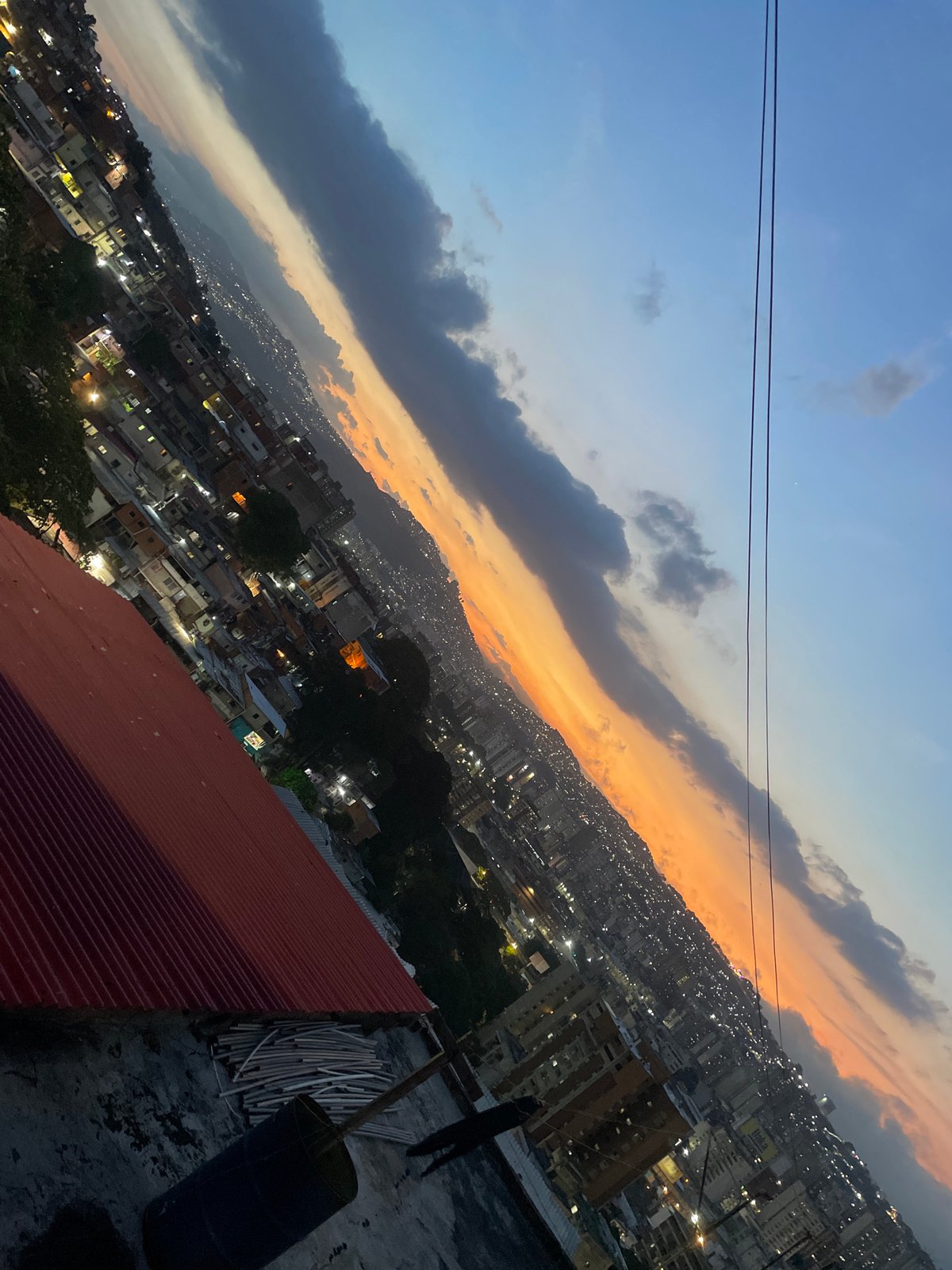 Caracas cityscape photographed from elevated perspective during sunset