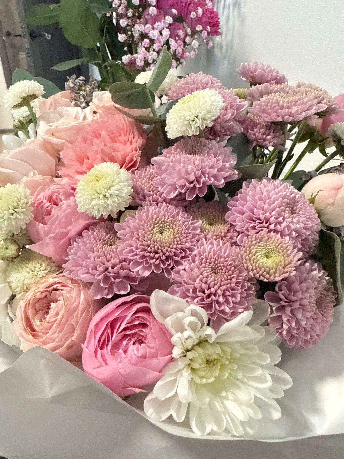 Woman receives flowers, cooks breakfast in Saint Petersburg morning