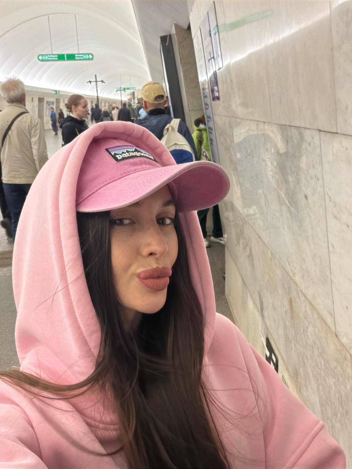 Woman records selfie video at Saint Petersburg subway station