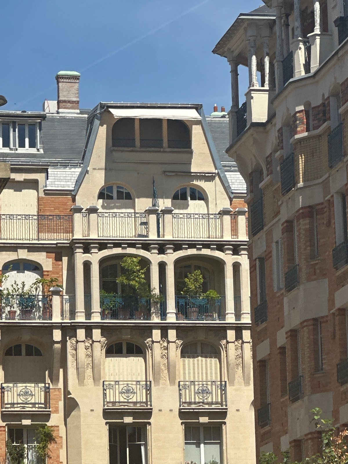 Sunny afternoon stroll through classic Parisian streets and architecture