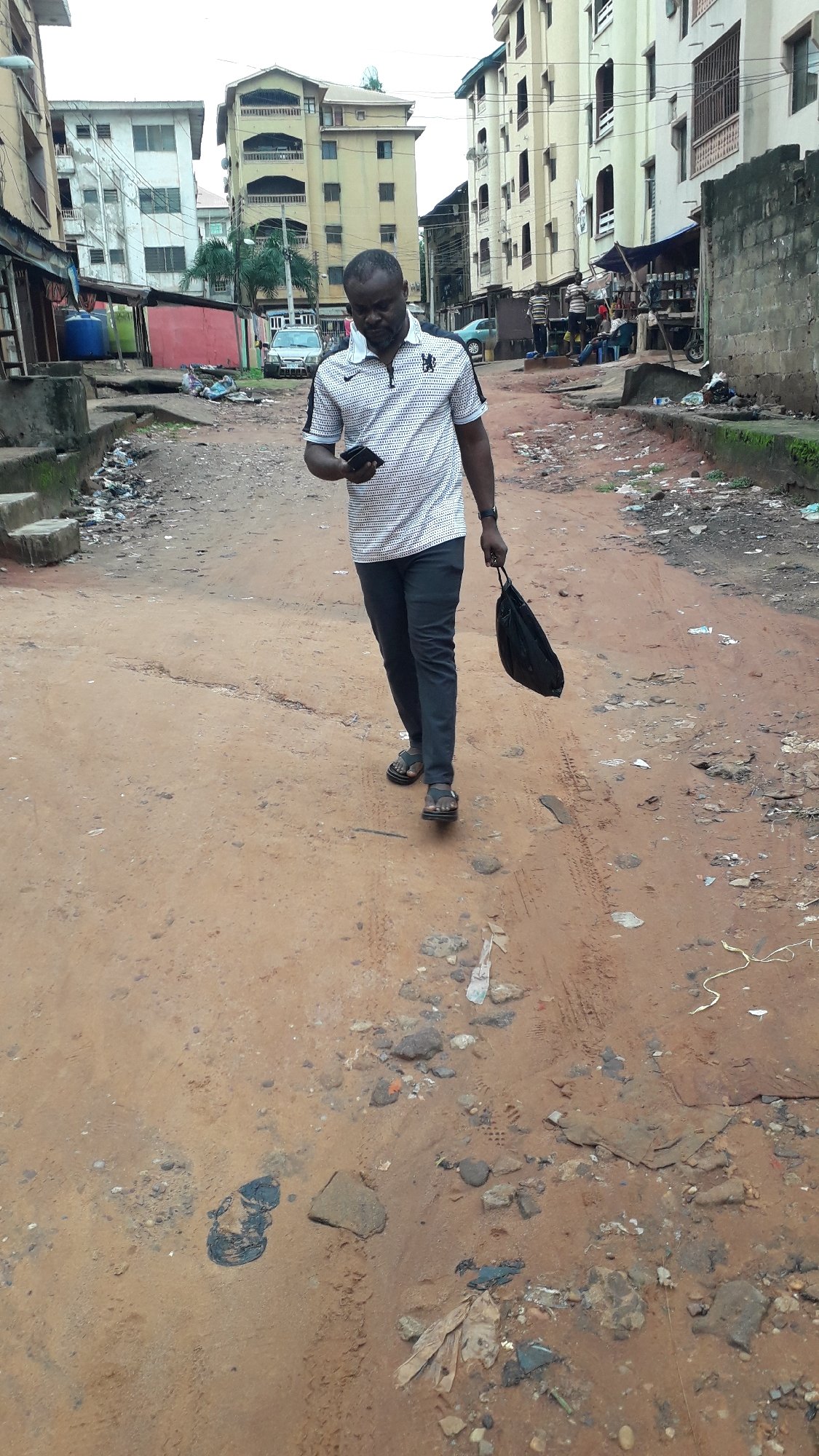Morning street life documented across Onitsha, Nigeria neighborhoods
