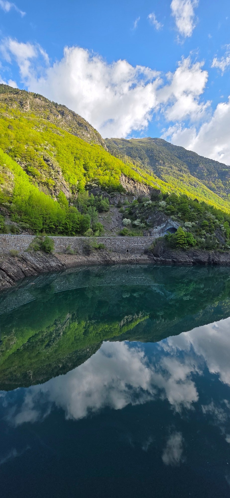 Mountain lake reflections captured in early morning Benasque Spain