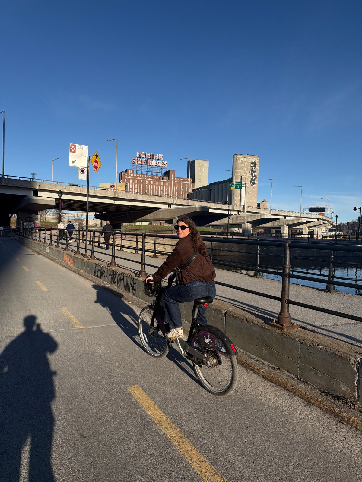 Evening cyclist spotted near Montreal's iconic Farine Five Roses waterfront