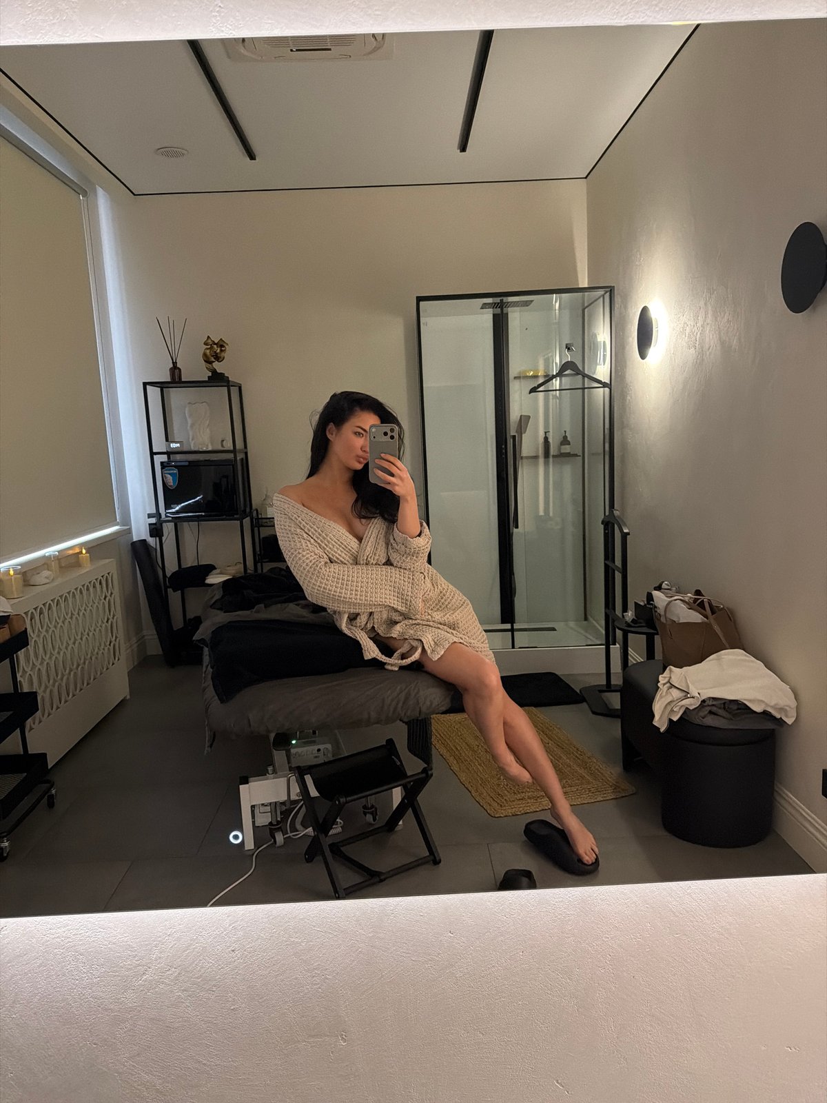 Woman photographed in two Moscow interior settings Monday morning