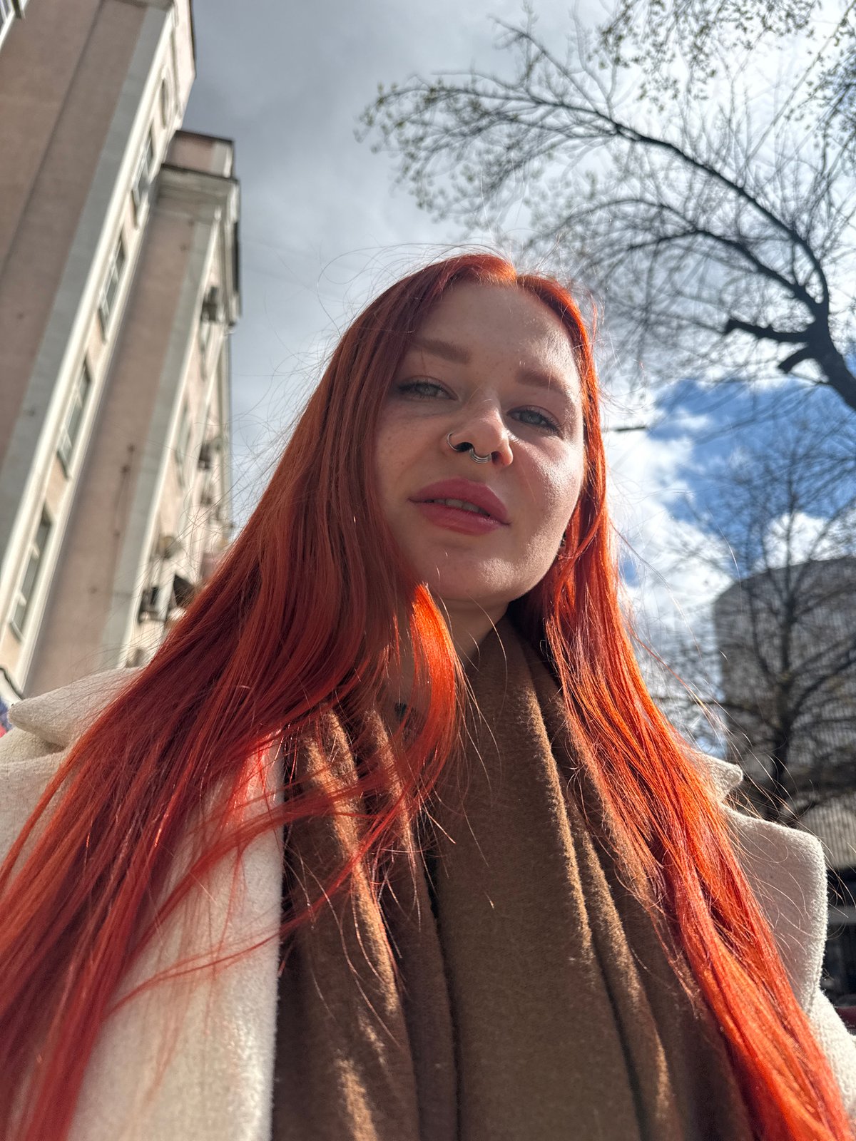 Woman takes selfies on Rostov-on-Don street