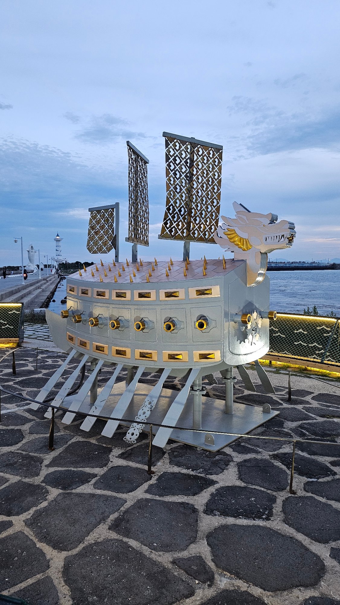 Visitor documents coastal art installations in Ulsan, South Korea