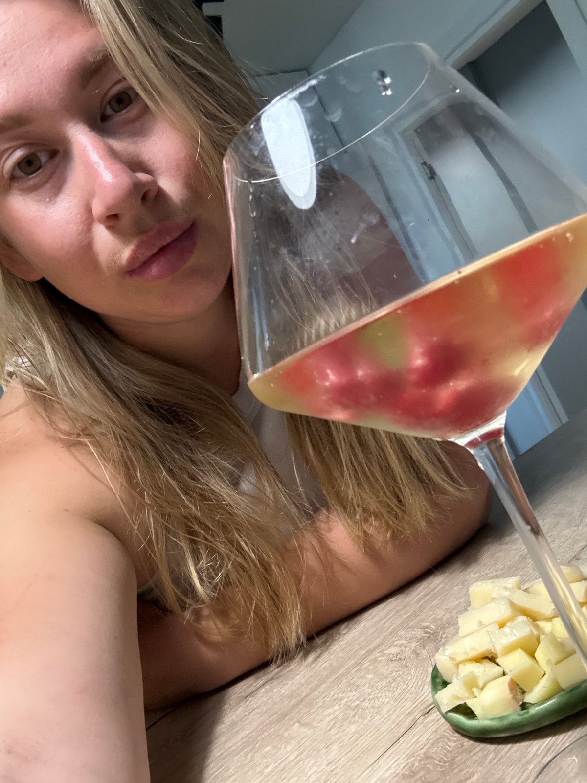 Relaxed indoor moment with hydrangeas and wine in Veliky Novgorod