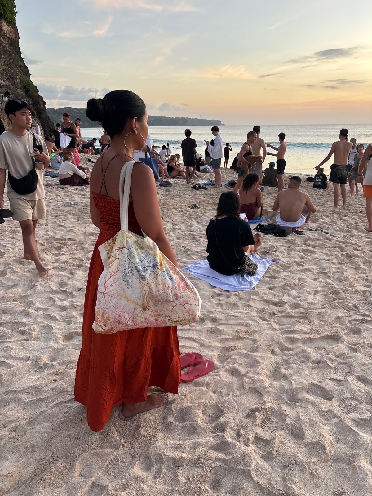 Busy beach day captured during sunset in Kuta Selatan