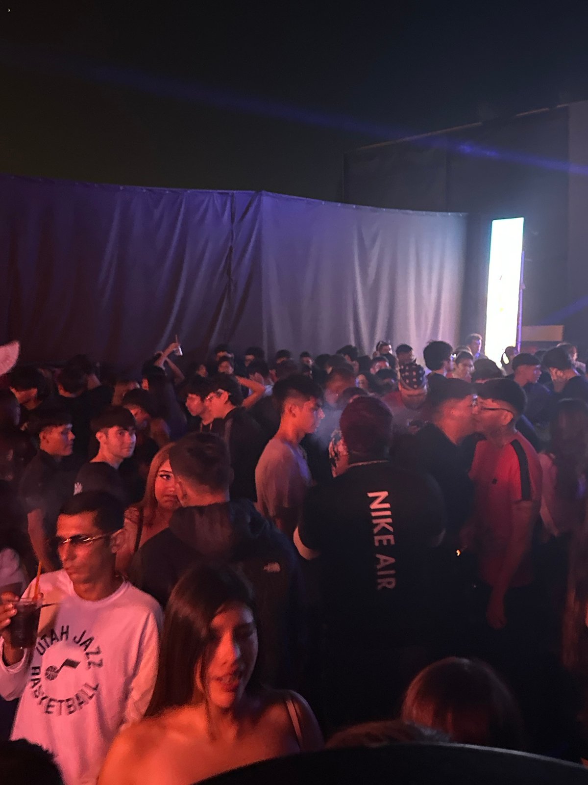 Nighttime concert or party draws crowds at MUMAI venue, Arica
