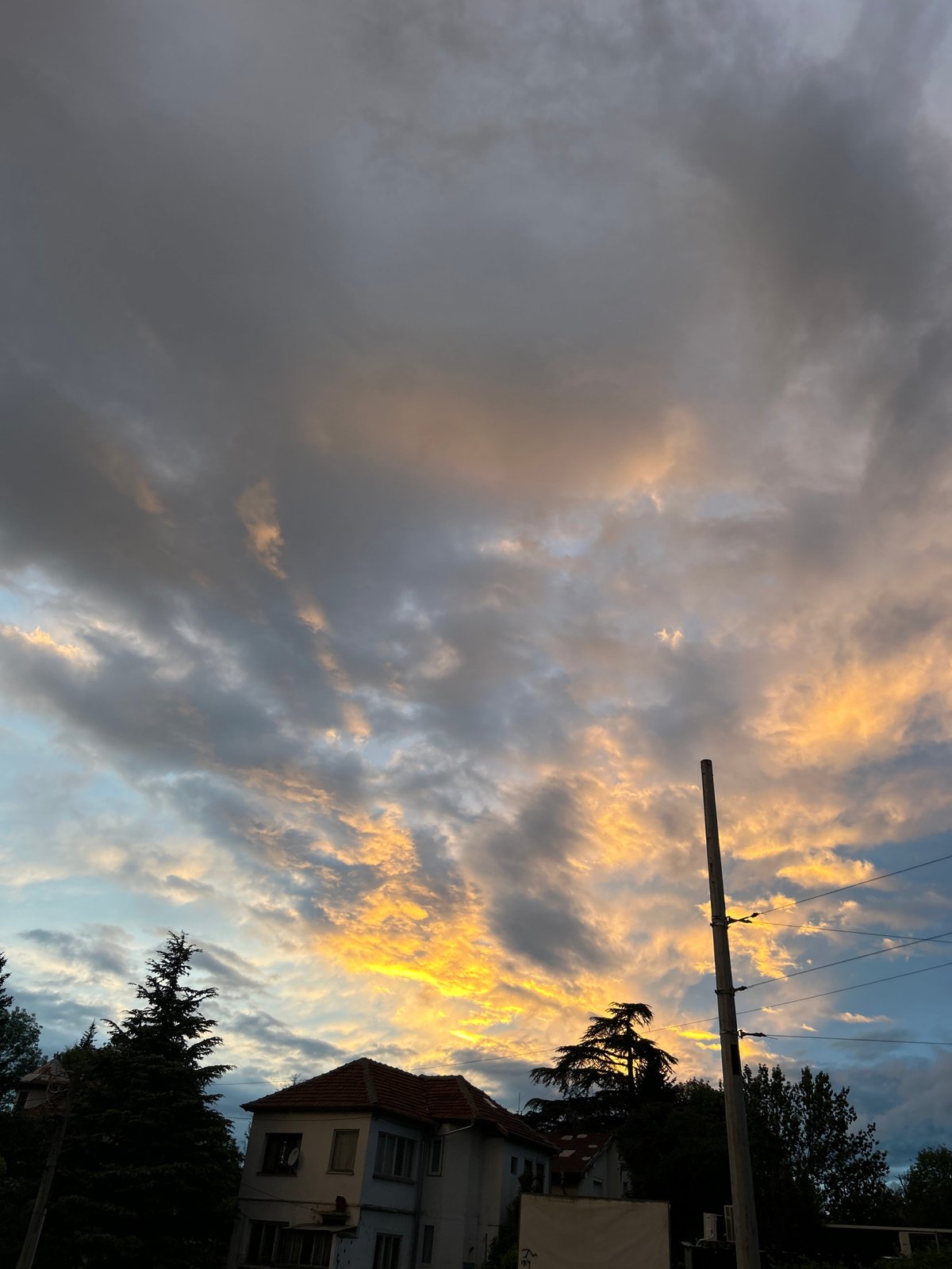 Evening clouds create dramatic sky display over Sofia