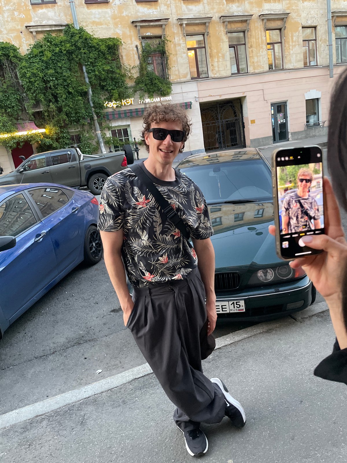 Couple documented during evening walk through central Saint Petersburg