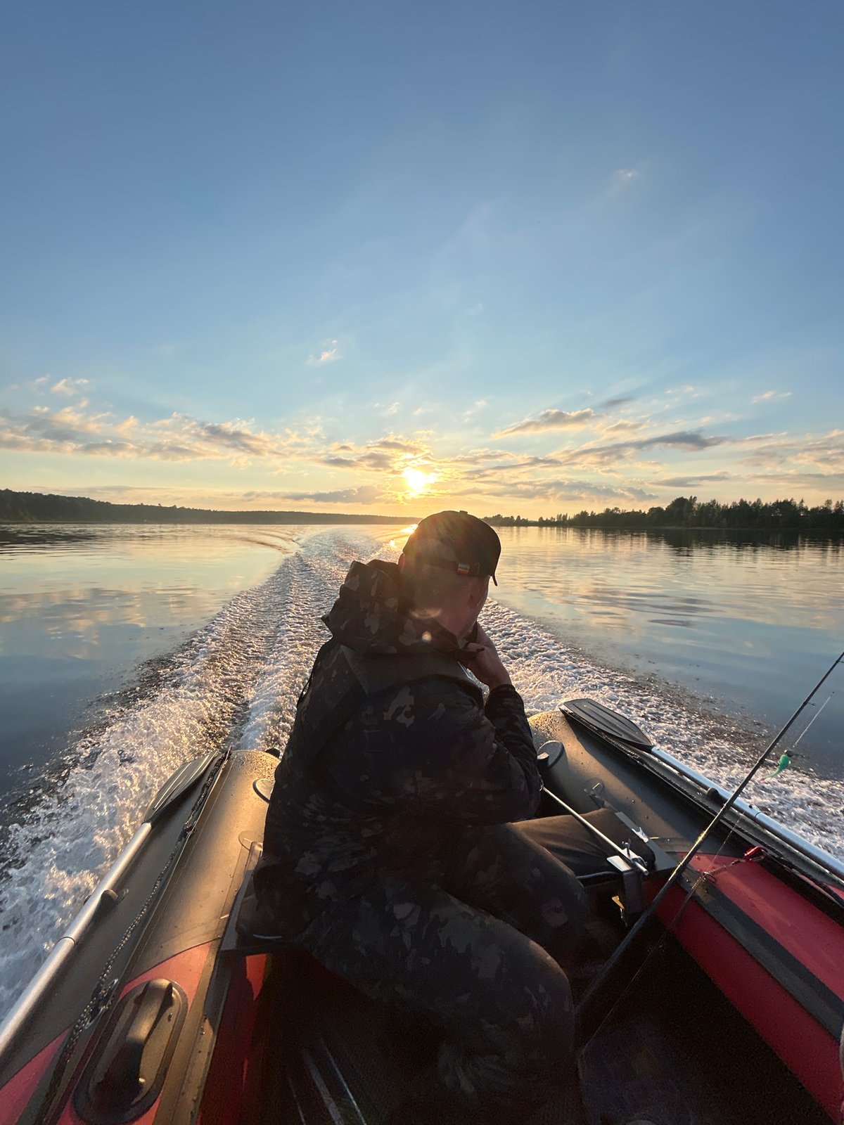 Solo boat ride at sunset on a Russian lake