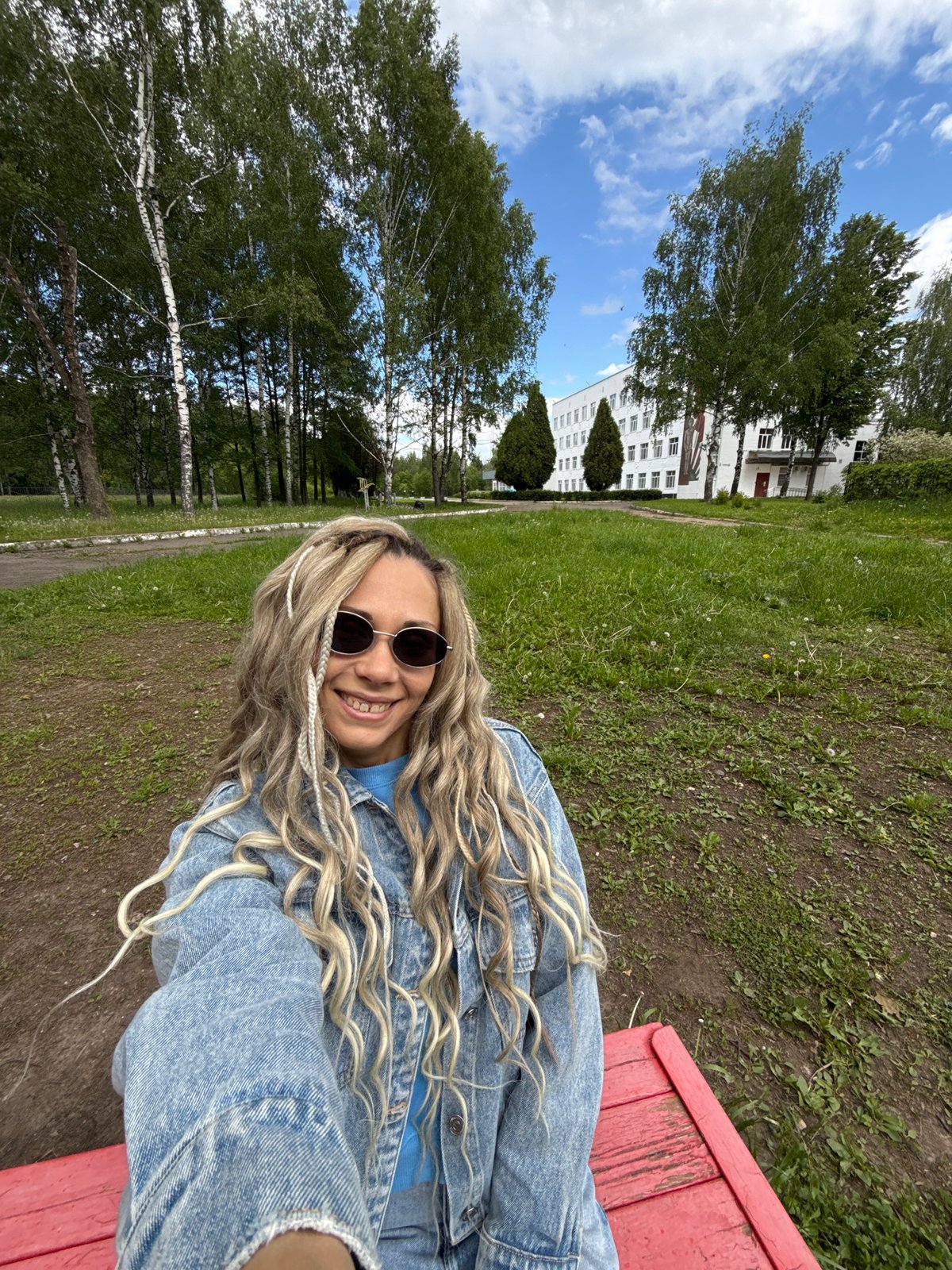 Woman photographed in multiple rural Russian locations during morning session