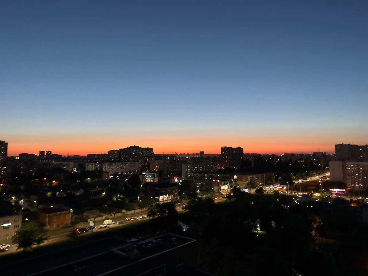 Krasnodar skyline at dusk, sky ablaze with sunset colors