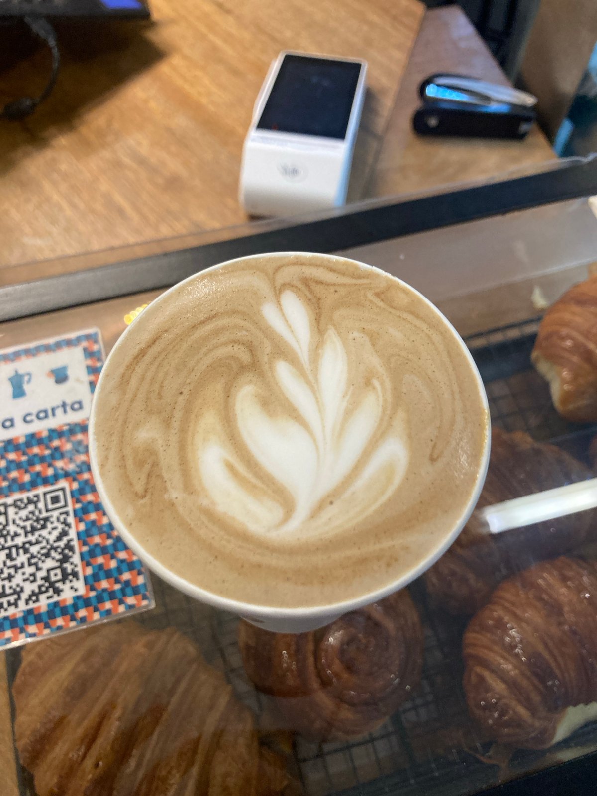 Intricate latte art captured in Buenos Aires coffee shop